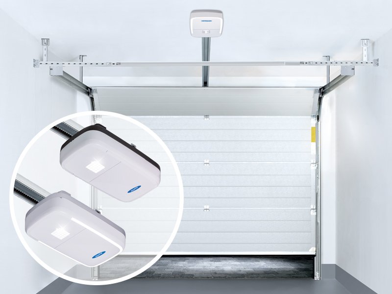 Novoferm Novomatic Italian garage door opener motors with white sectional door at ArkNova Interiors Paphos Cyprus