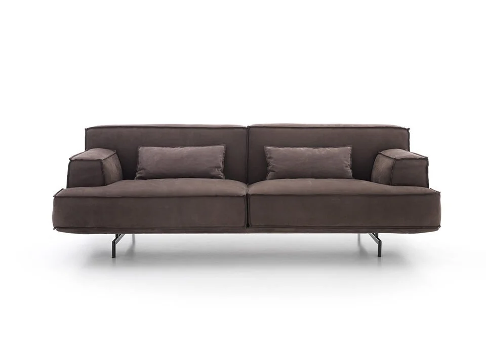 Albani Divani Noha Italian brown two-seater sofa with black legs, modern design at ArkNova Interiors Paphos showroom in Cyprus