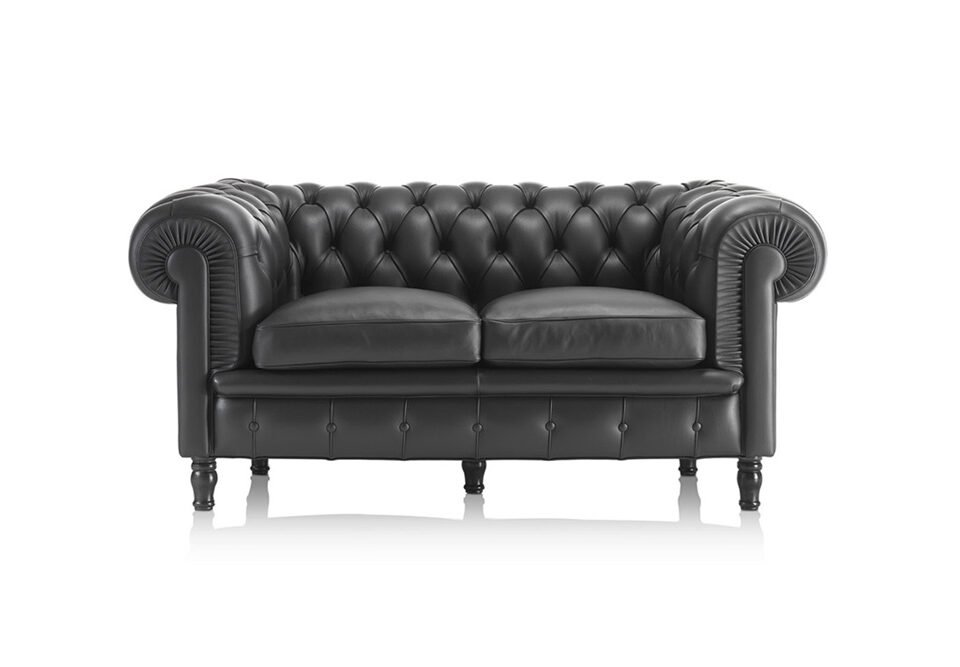 Albani Divani Chesterfield Italian black leather two-seater sofa, classic tufted design at ArkNova Interiors Paphos showroom in Cyprus