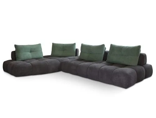 Miki Ferrari Pop Italian dark gray L-shaped sectional sofa with green pillows, contemporary design at ArkNova Interiors Paphos showroom in Cyprus