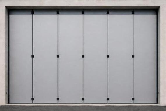 Novoferm CGT Gates Italian gray folding industrial doors closed at ArkNova Interiors Paphos Cyprus
