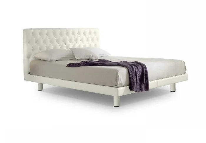 Italian Florian bed by Albani Divani with classic white button-tufted headboard at ArkNova Interiors Paphos showroom in Cyprus