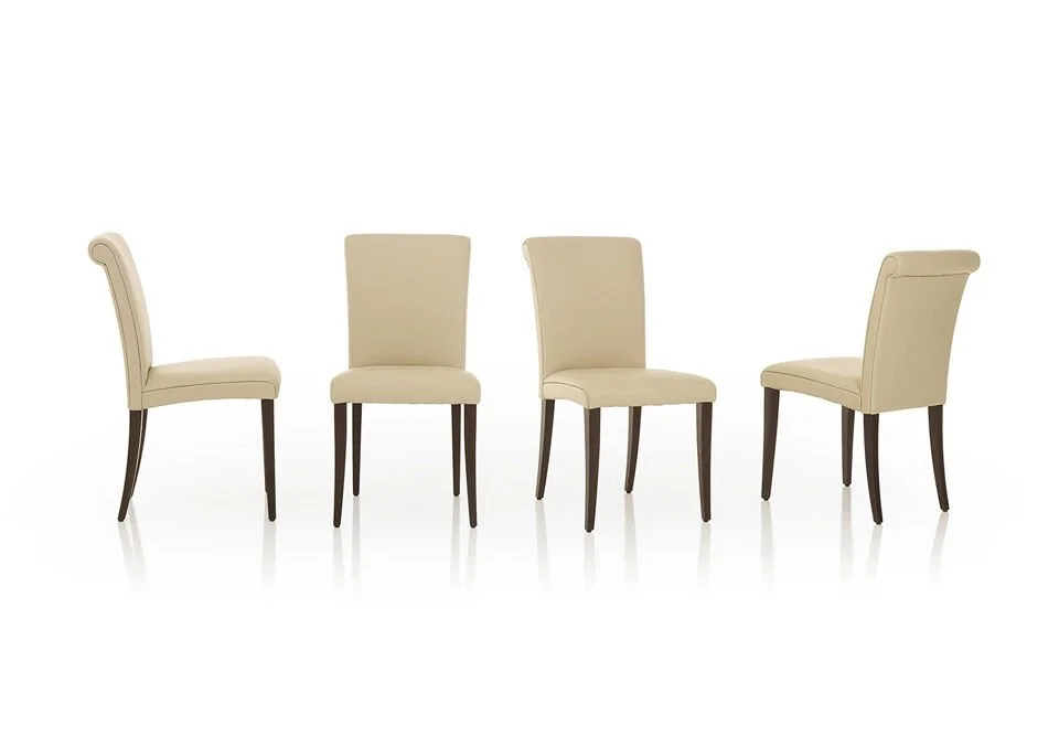 Albani Divani Elen Italian beige dining chair with rolled top and dark wood legs at ArkNova Interiors Paphos showroom in Cyprus