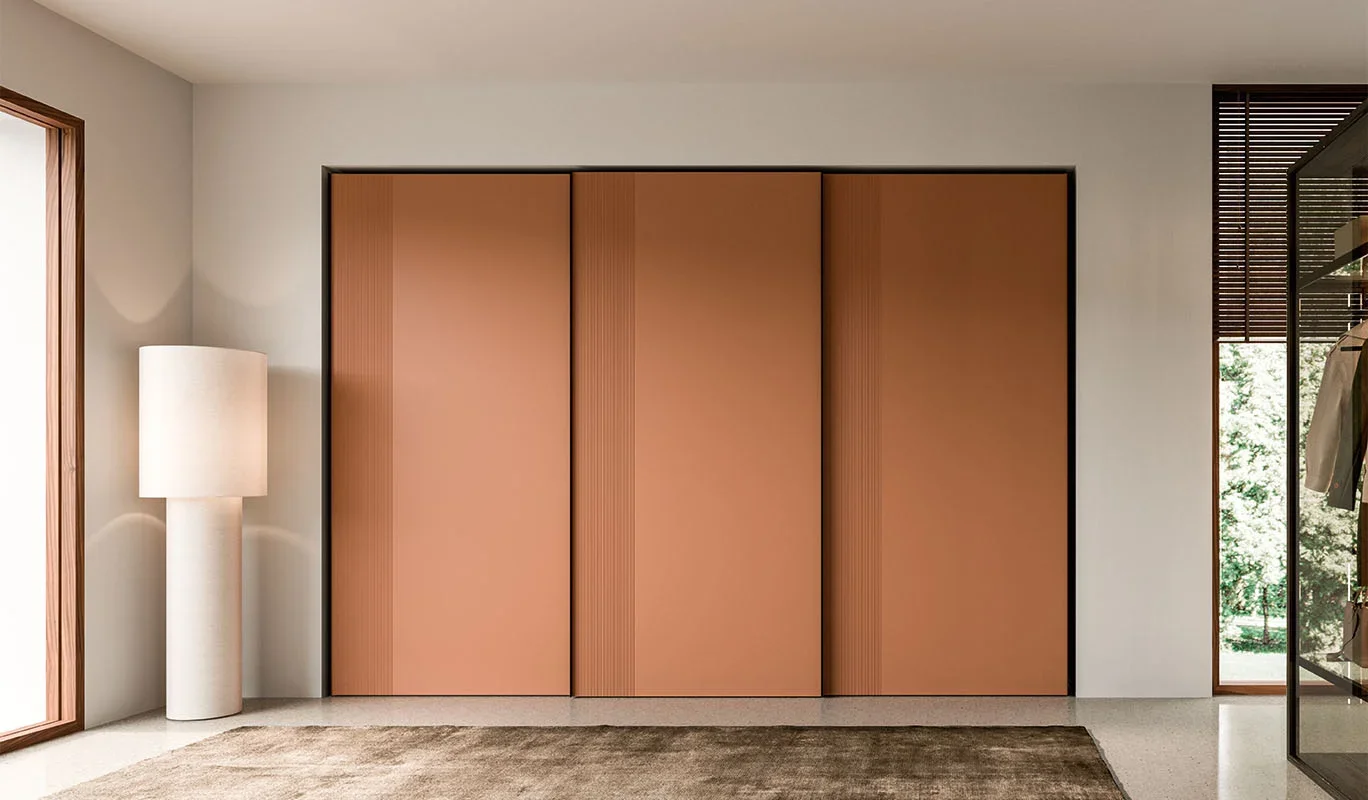Italian Cinquepuntozero Match Door terracotta sliding wardrobe doors at ArkNova Interiors Paphos showroom in Cyprus