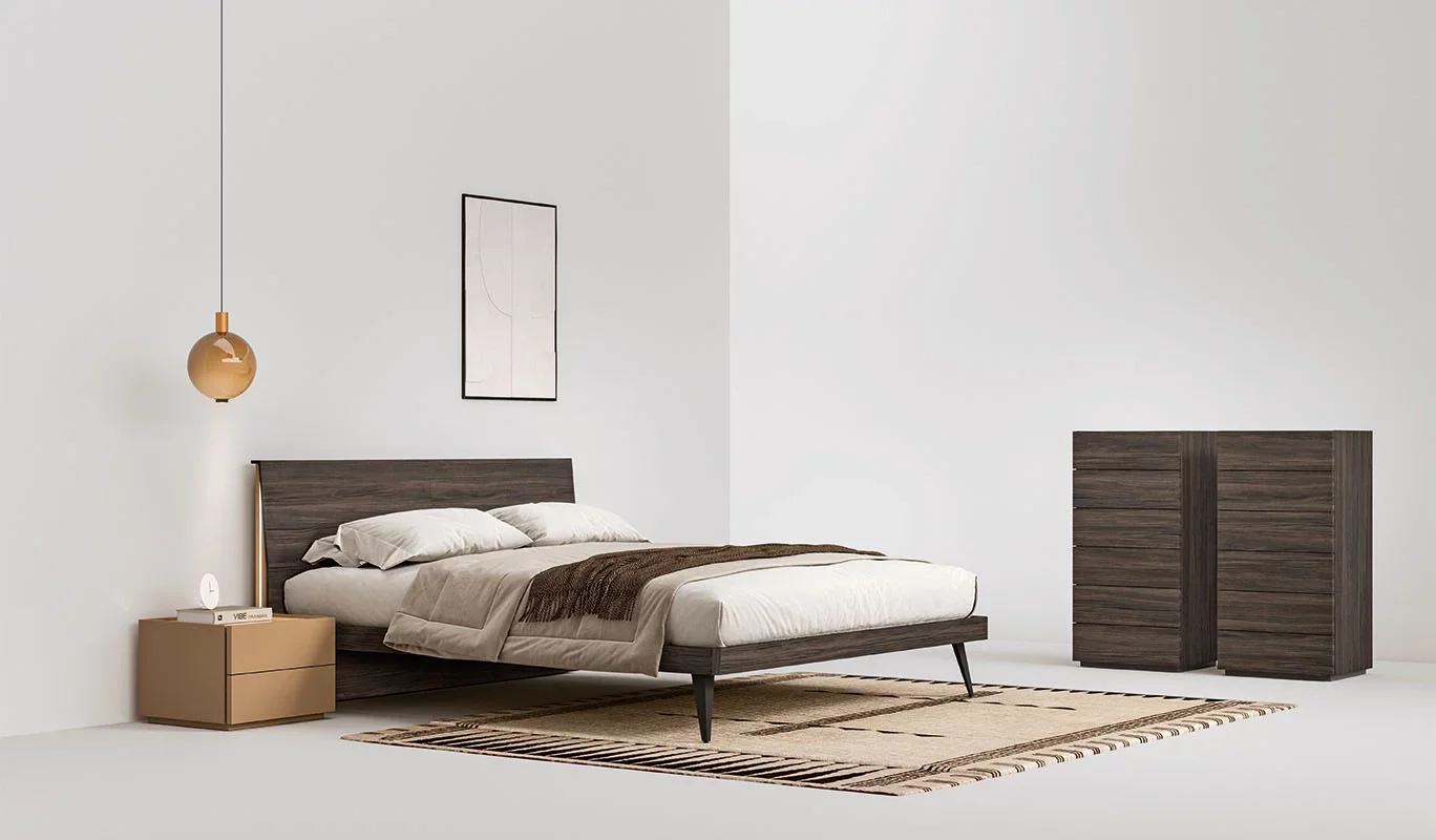 Italian Caleidos bed by Cinquepuntozero with dark wood headboard and mid-century legs at ArkNova Interiors Paphos showroom in Cyprus