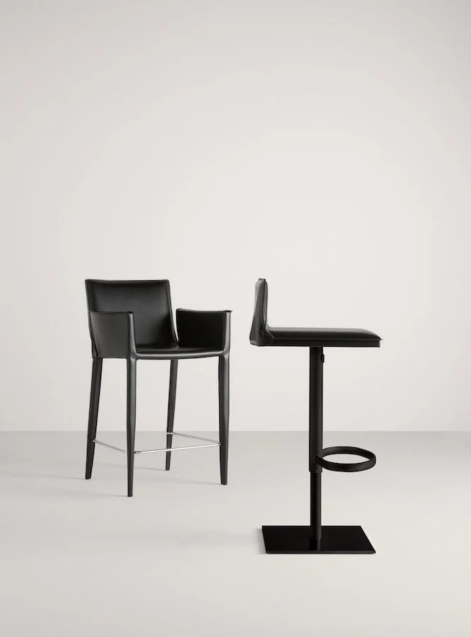 Frag Latina GP Italian black leather bar stools with arms and footrest at ArkNova Interiors Paphos showroom in Cyprus