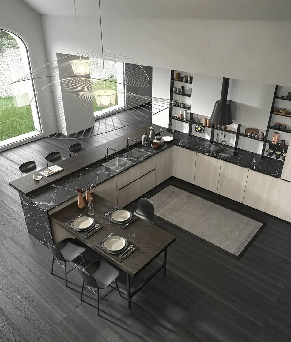 Antares Cucine MK18_L Italian modern kitchen with large black marble island, bar stools, adjacent dining table and sculptural pendant light at ArkNova Interiors in Paphos Cyprus