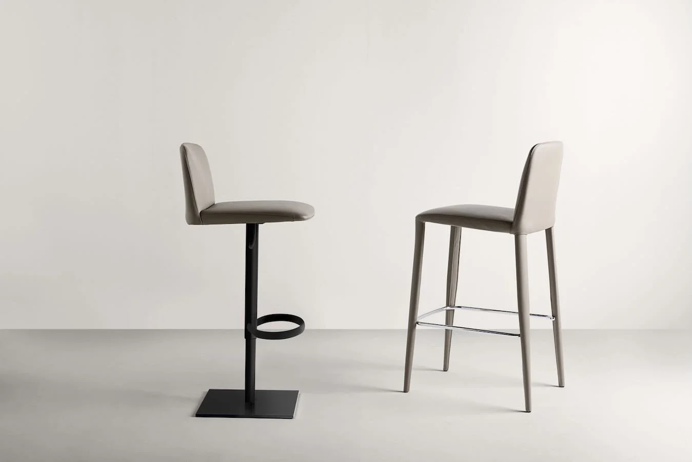 Frag Elf GP Italian beige leather bar stools with black and chrome bases at ArkNova Interiors Paphos showroom in Cyprus