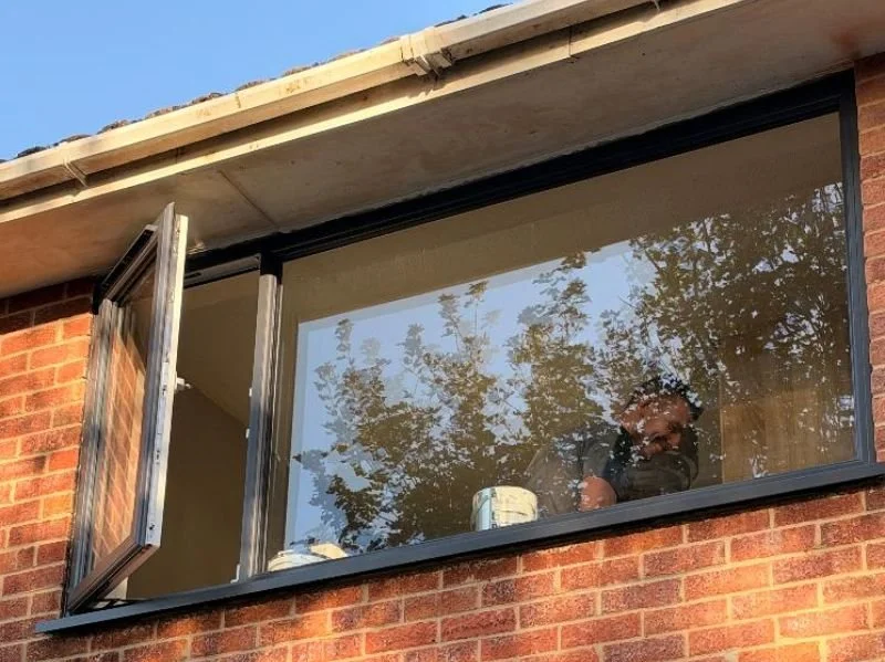 Window Installation Black UPVC