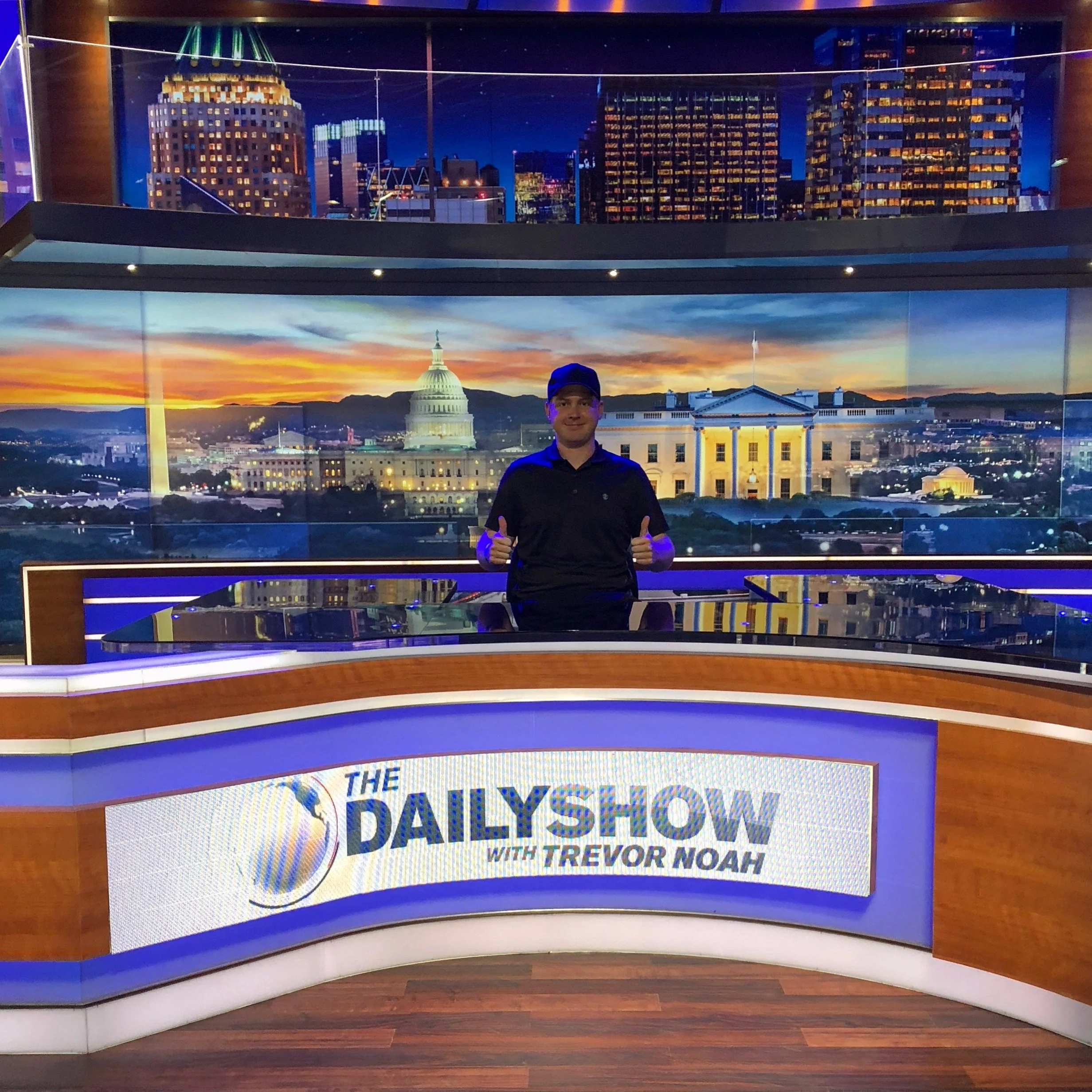 Andrew Henkelman in 2015 behind The Daily Show desk during the launch of Trevor Noah as host.