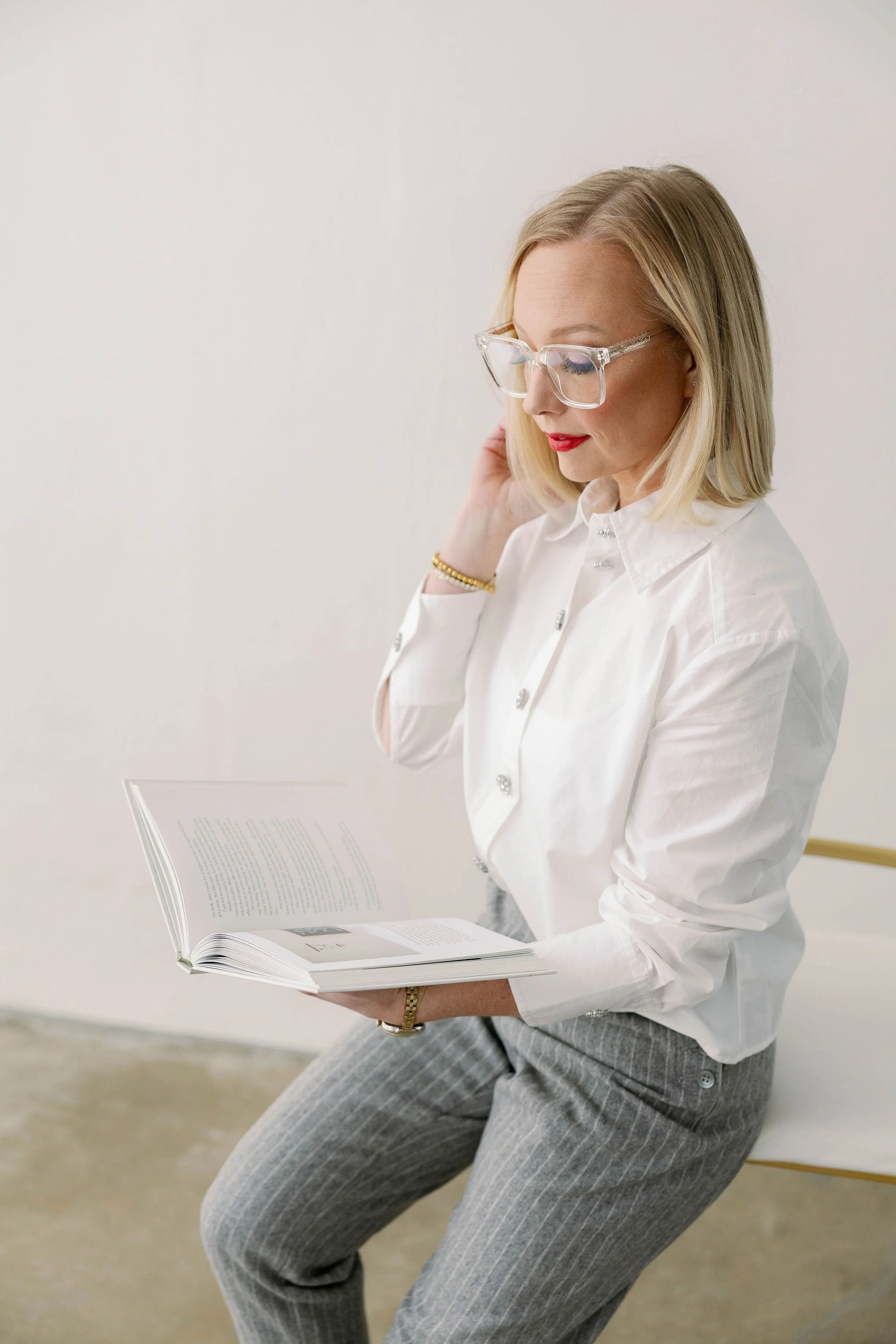 Emily Ferrara at work, brand and web design studio founder" / "Emily Ferrara reading, Dssentials founder