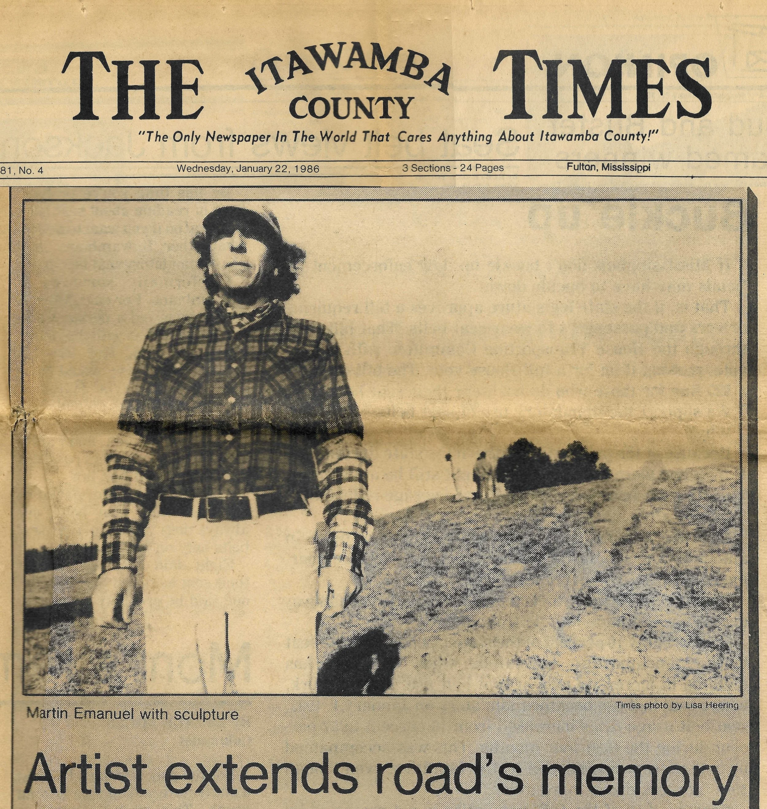 A black and white photo of a woman standing outdoors on a hilltop with a sculpture in the background, on the front page of a newspaper titled 'The Itawamba Times' dated January 22, 1986.