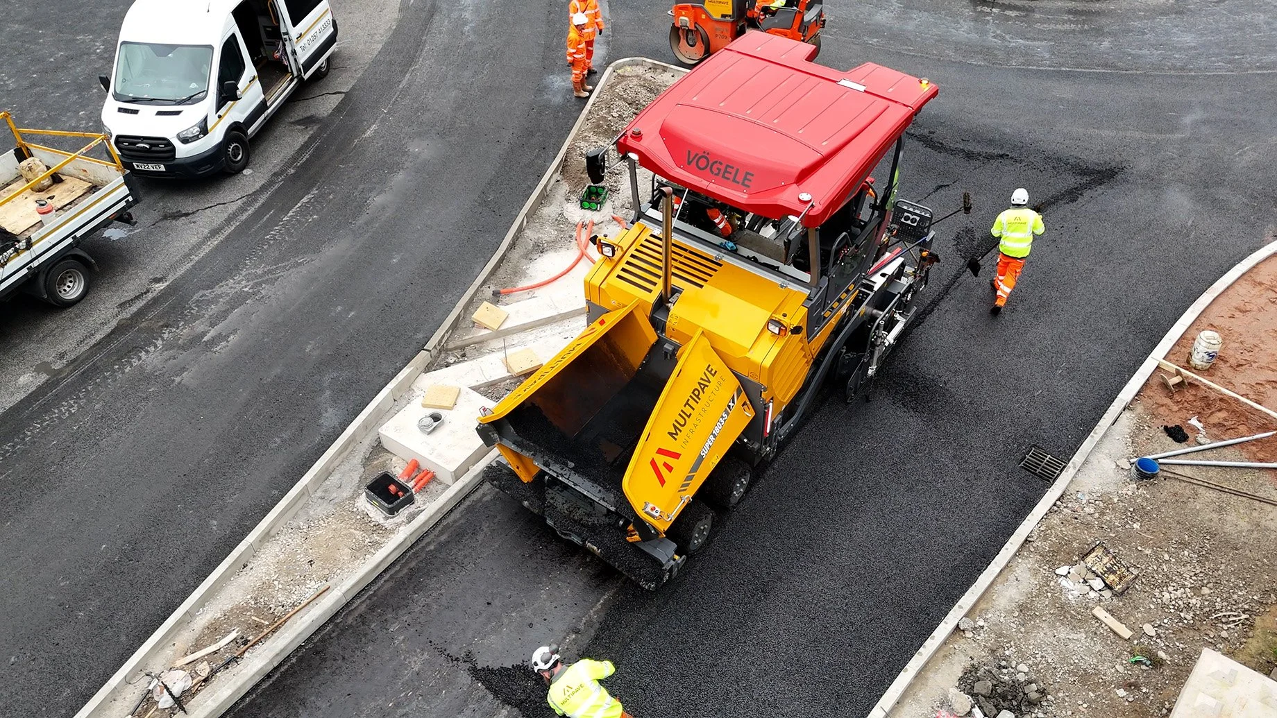 Drone shot of a Multipave branded paver machine