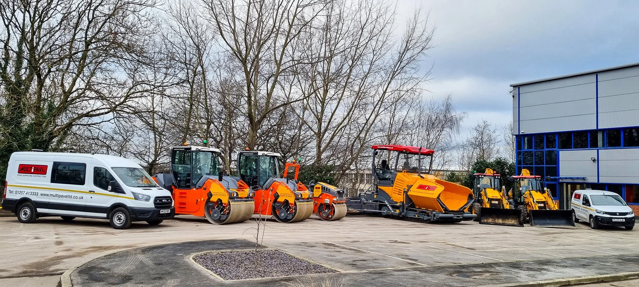 Image of Multipave branded machinery and office building