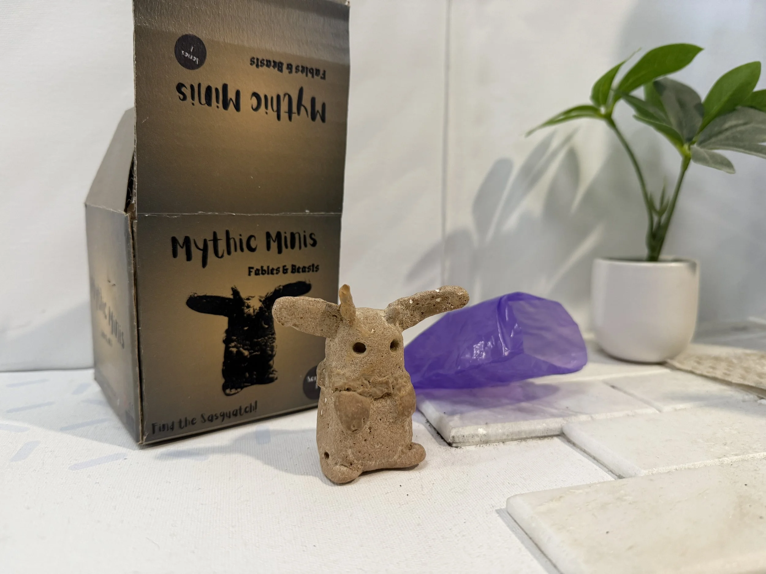 An image of a small cement figure