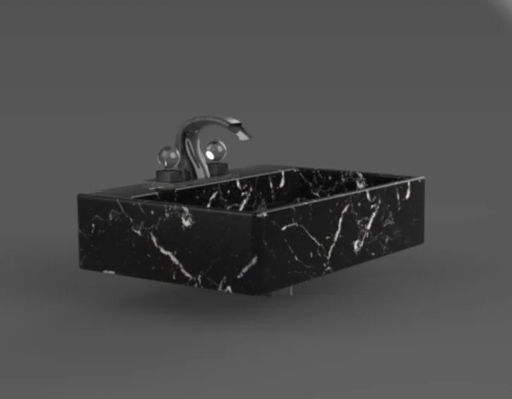 Black marble bathroom sink with a chrome faucet and handles against a gray background.