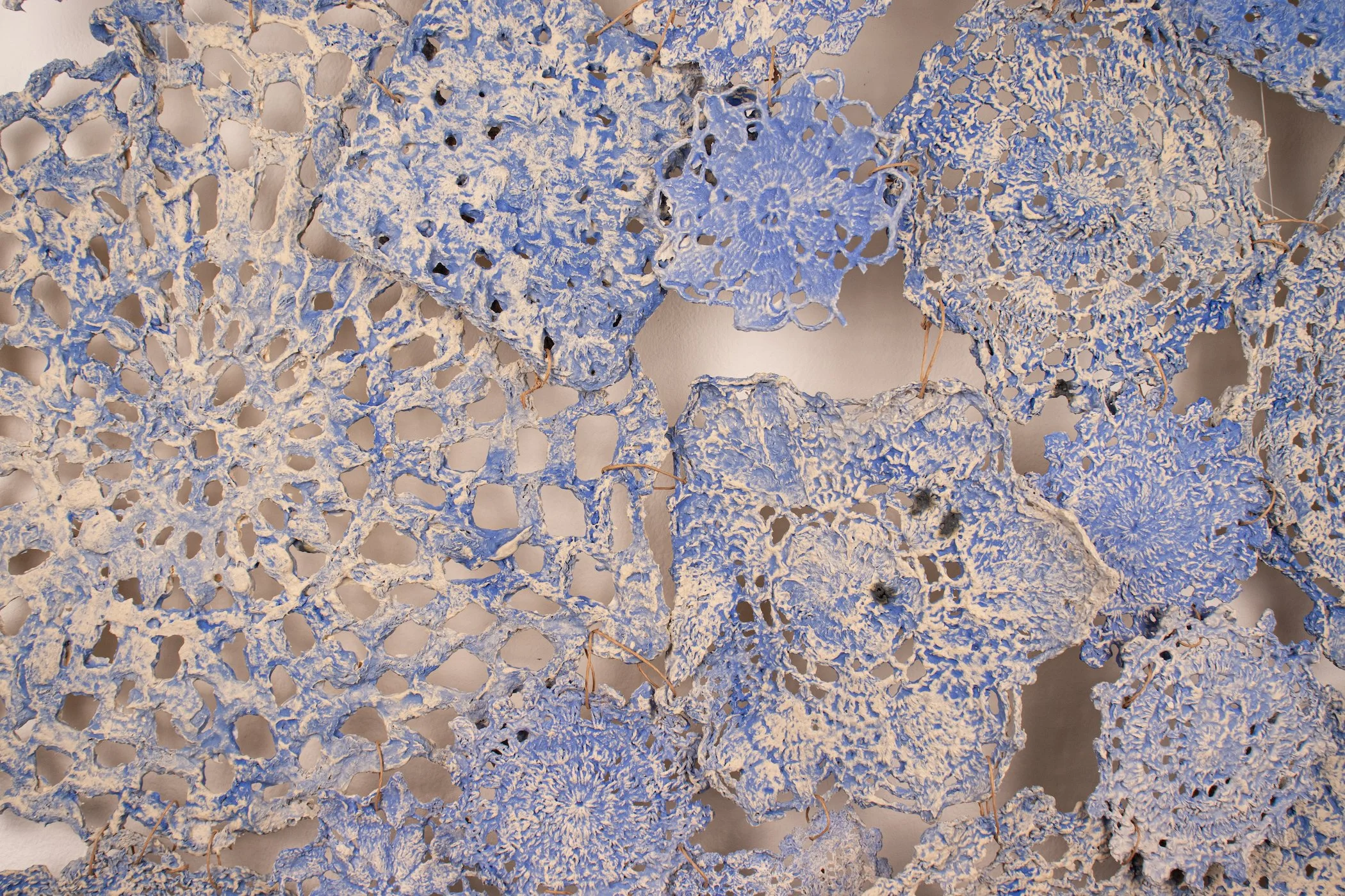 “Hold Me Close” (detail)
2025
Slip-cast doilies, twine wire