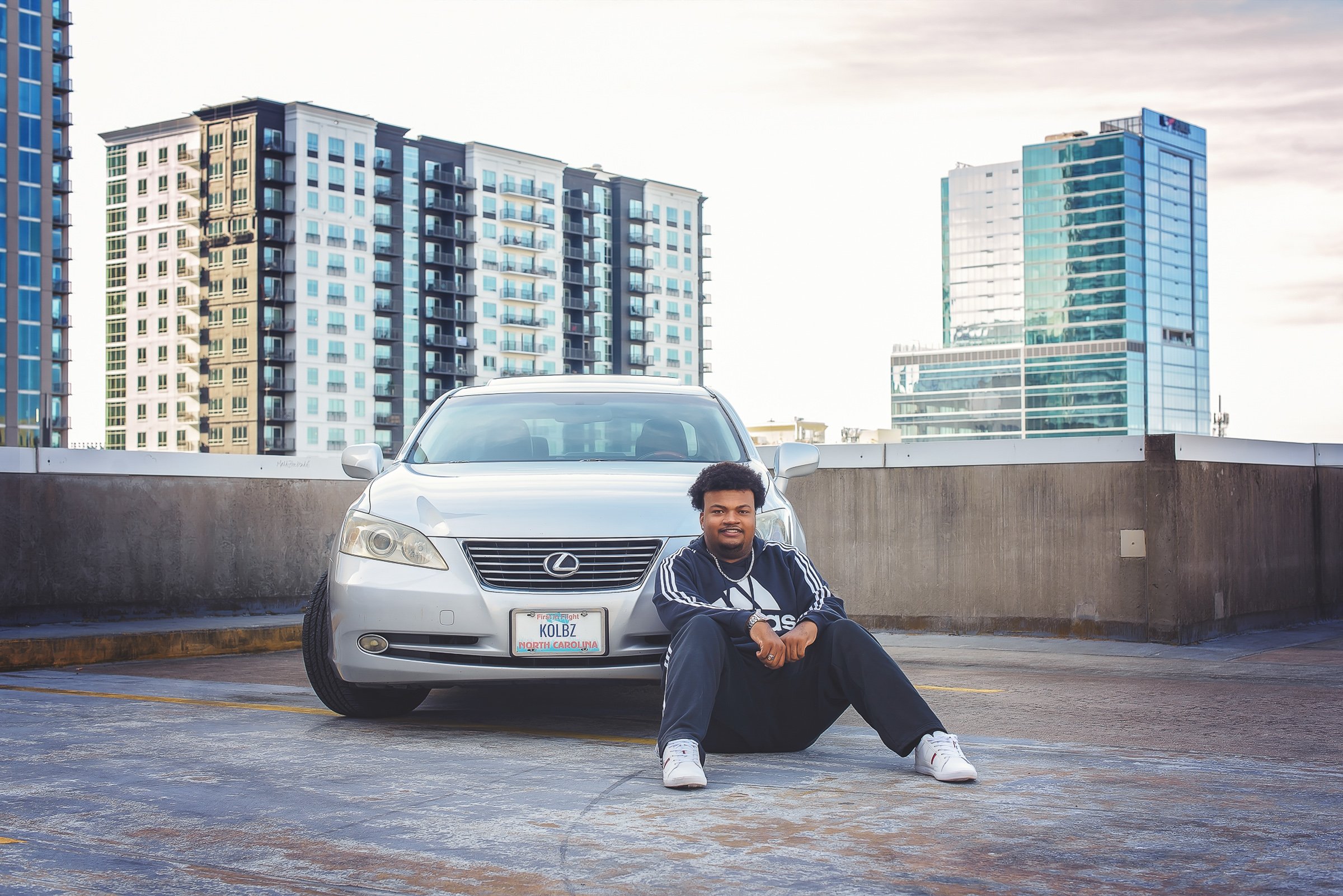 charlotte-nc-senior-portraits-uptown-garage-car