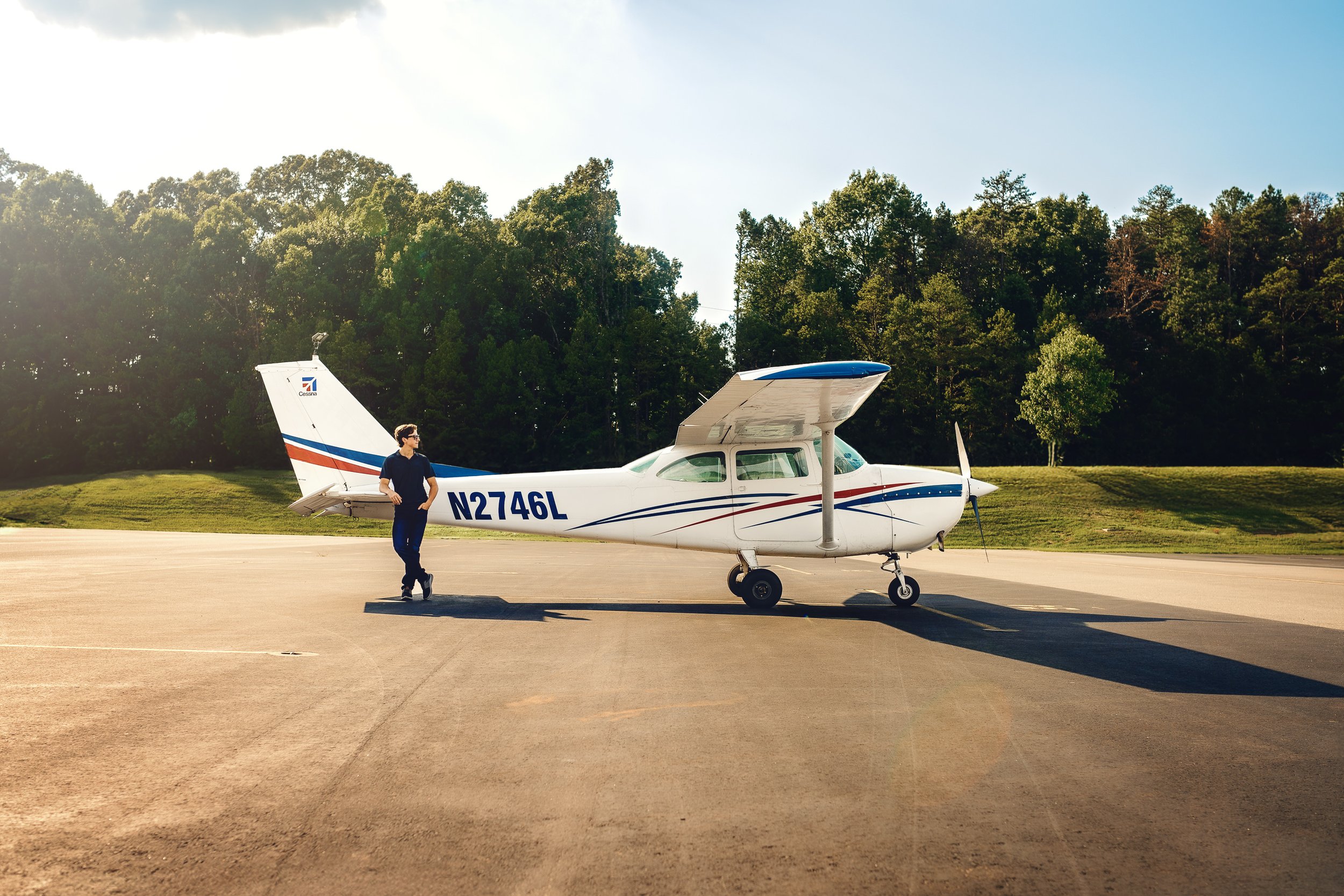 zach-pilot-senior-session-monroe-executive-airport-2.jpg