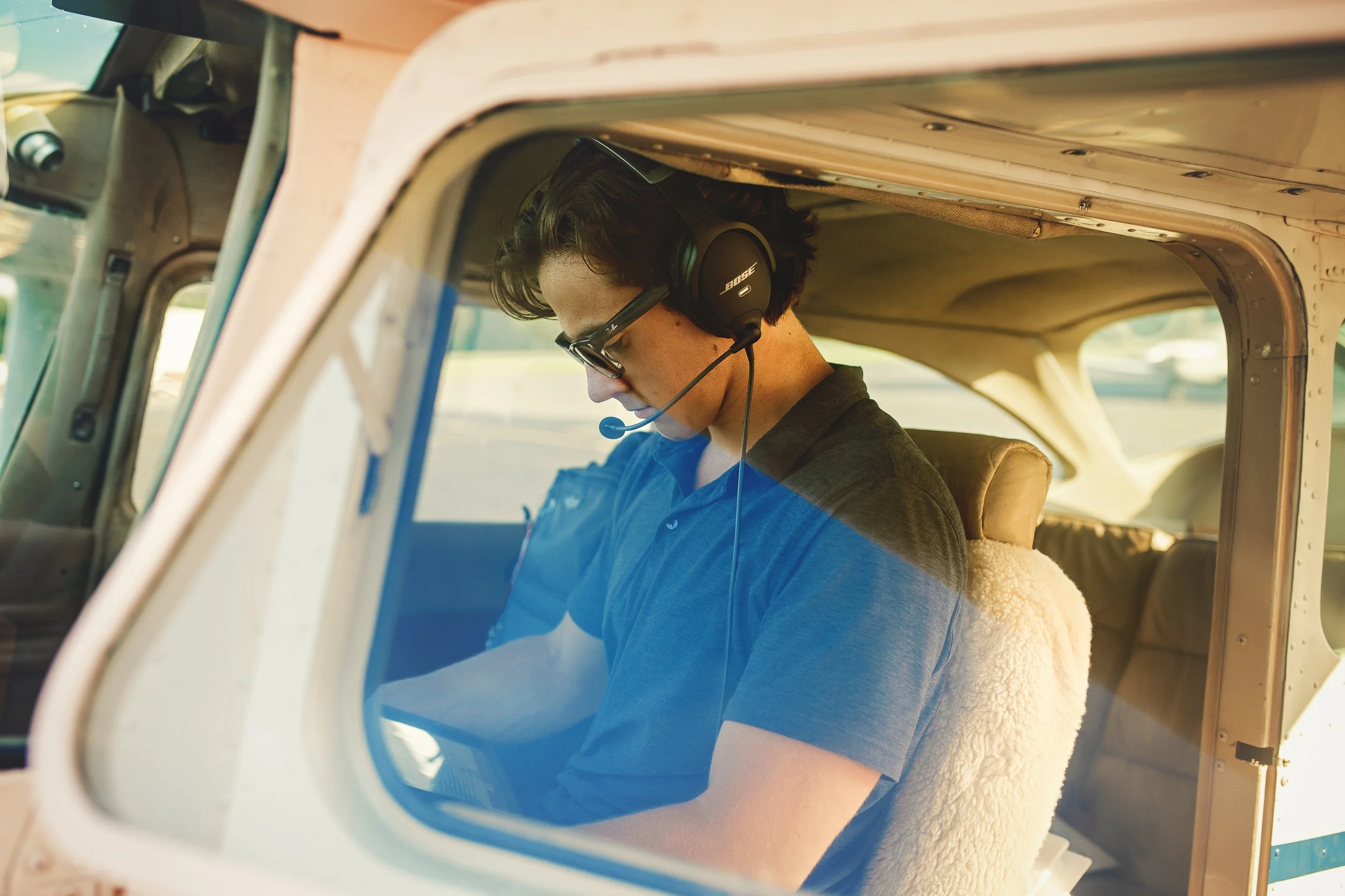 zach-pilot-senior-session-monroe-executive-airport-6.jpg