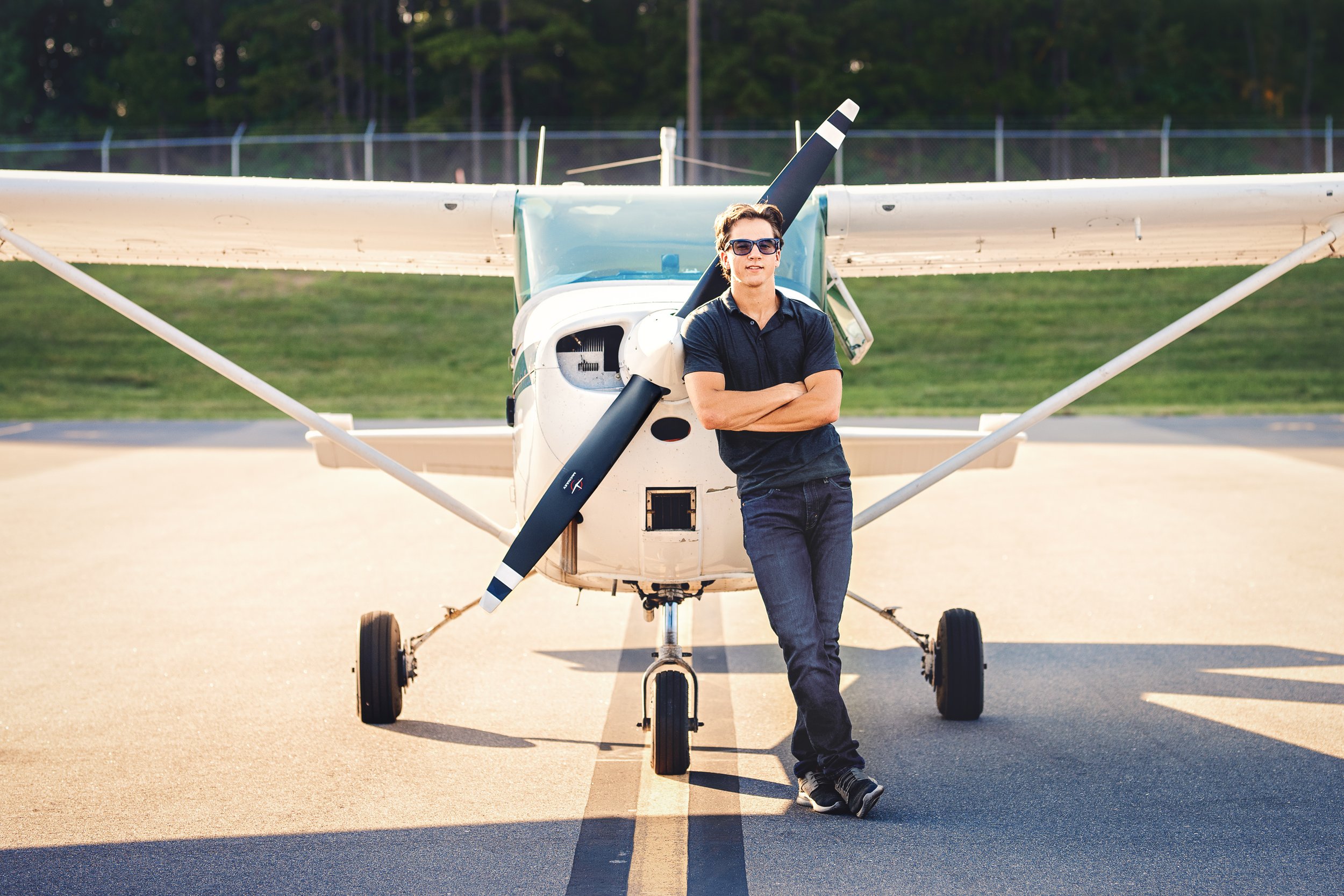 zach-pilot-senior-session-monroe-executive-airport-9.jpg