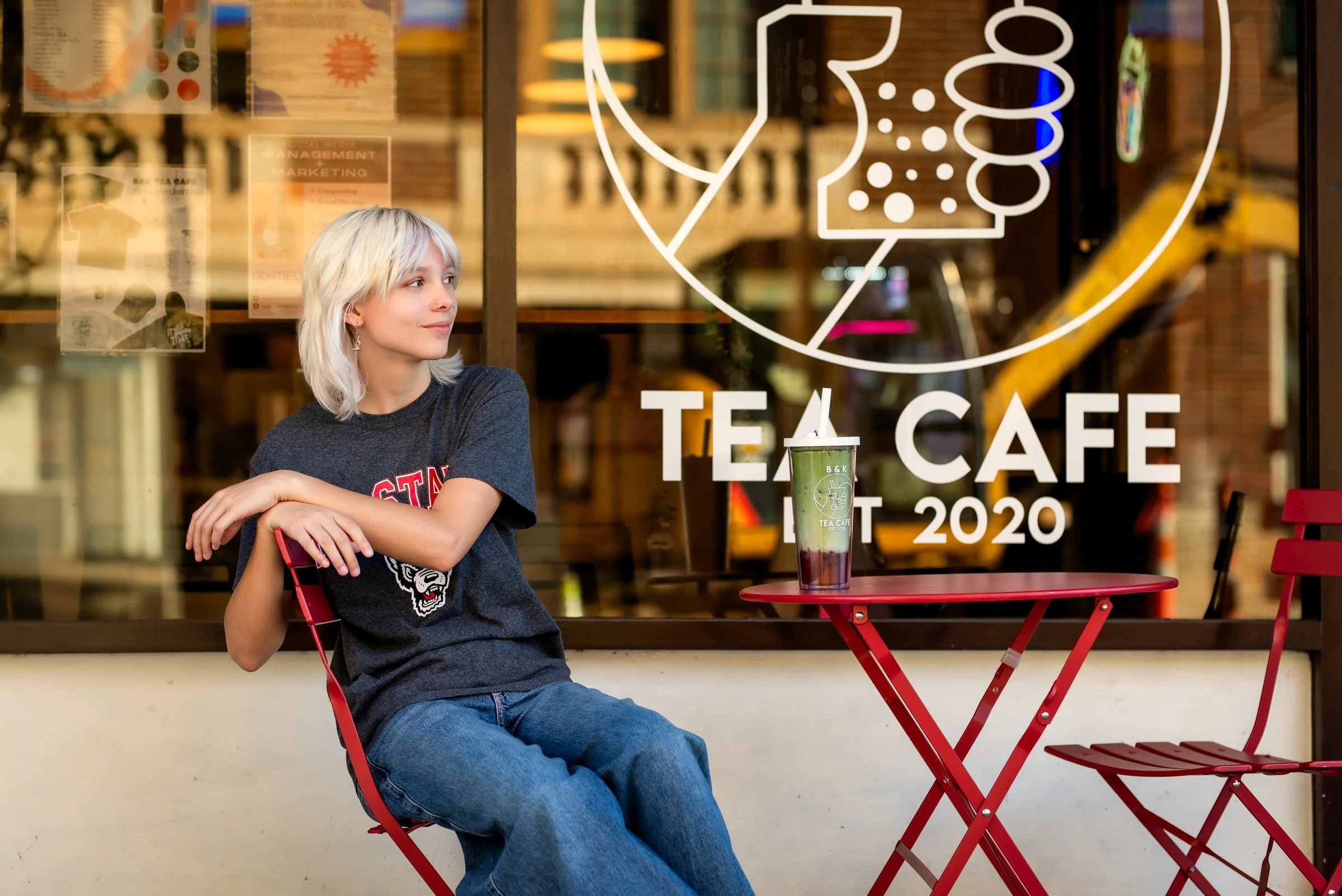 Charlotte NC senior pictures - senior girl at tea cafe in downtown setting