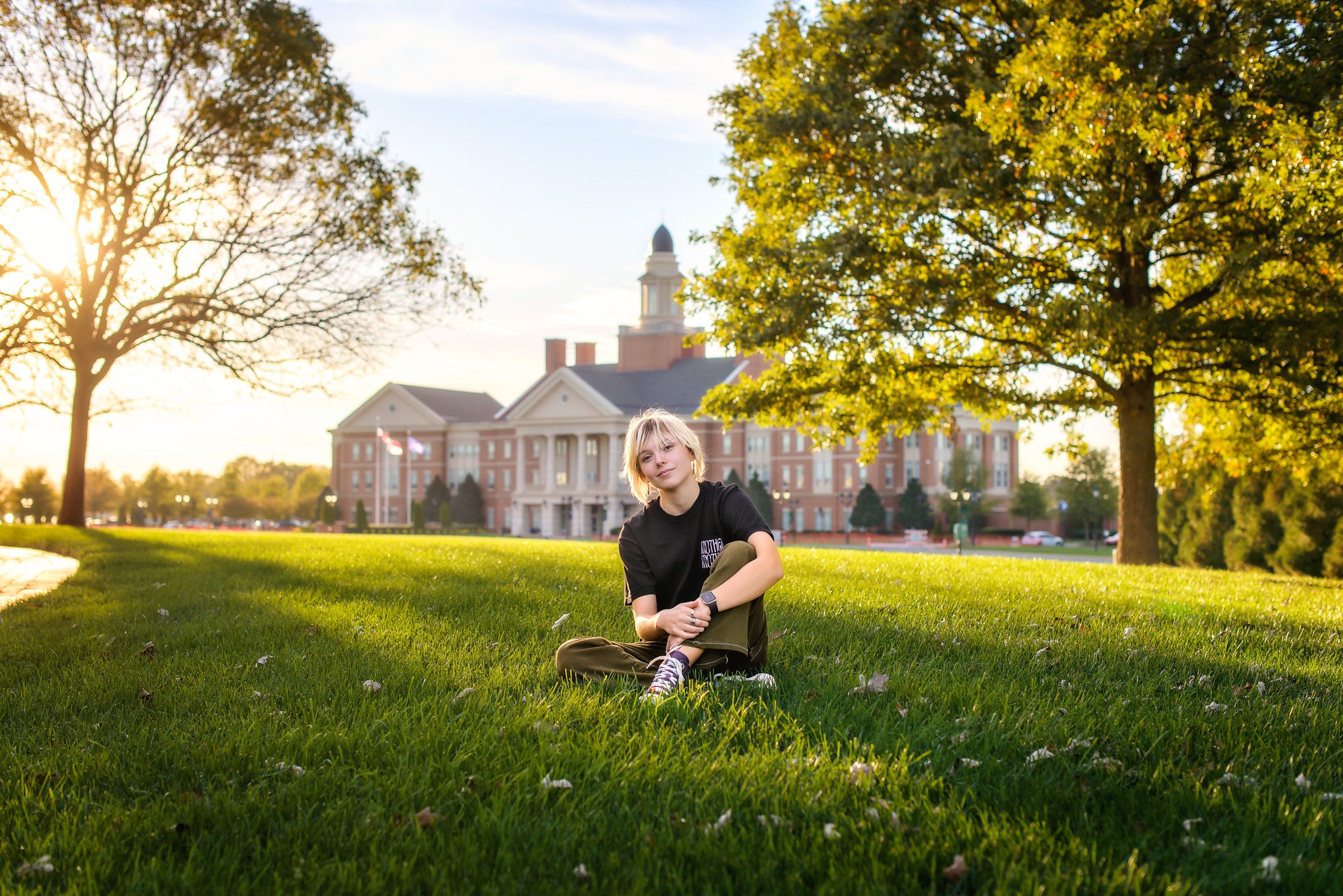 Adrien senior portrait at University research campus at sunset in Kannapolis NC