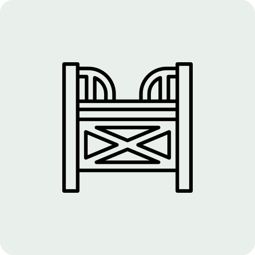 Outline drawing of a small shop or kiosk with a striped awning.
