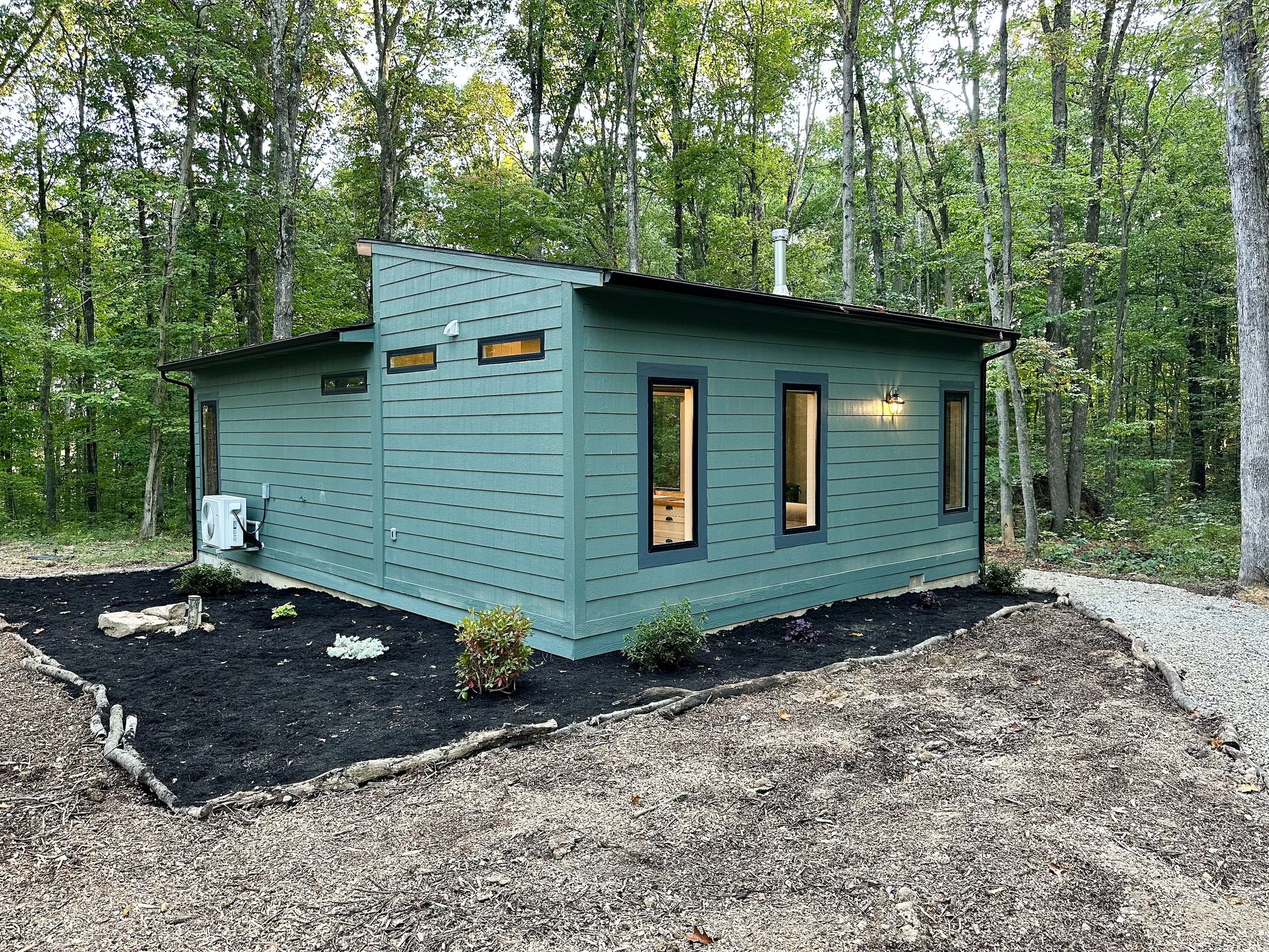 Tiny home cabin build in Hocking Hills, Ohio. Design by Shannon Wintheiser, owner at Roundhouse Renovations, ADU experts in Cincinnati, Ohio.”}】</assistant>leigh> {