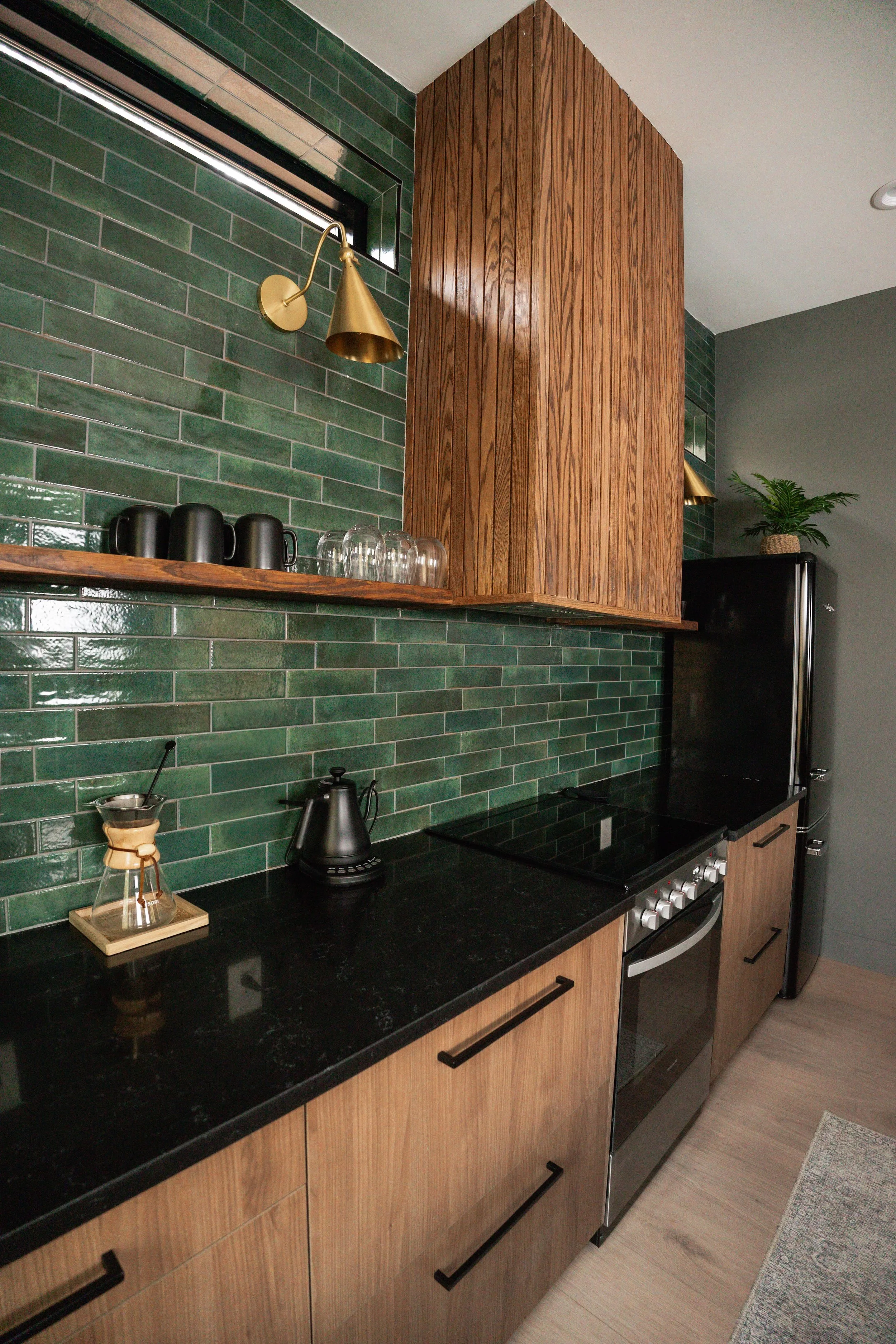 STR Airbnb Modern Cabin Wilder at Hocking Hills green tile ktichen flat panel wood cabinets