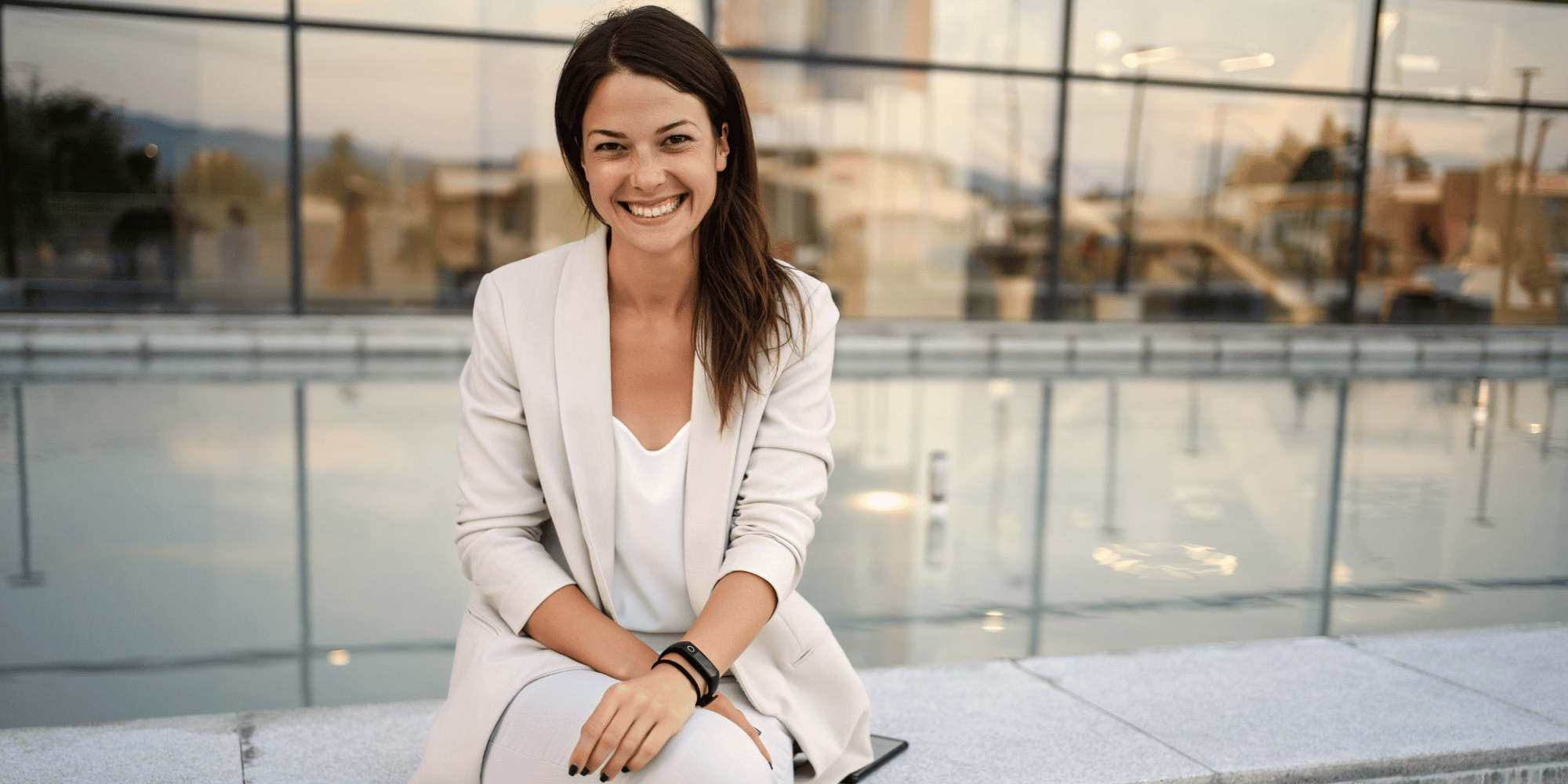 Smiling professional representing client success and trust in BSP's employee benefits brokerage and consulting services