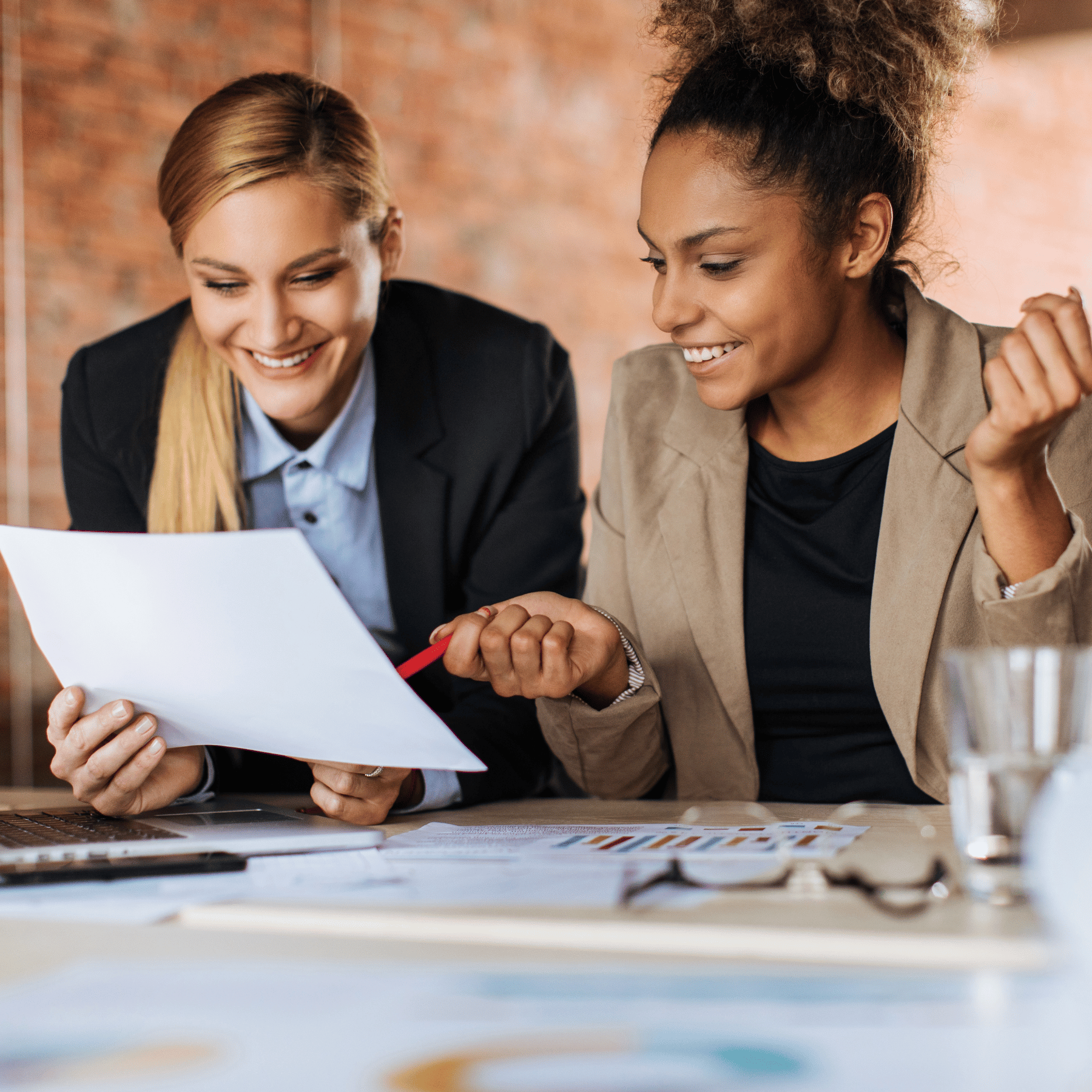 Employee benefits consultant reviewing a benefits plan with a client