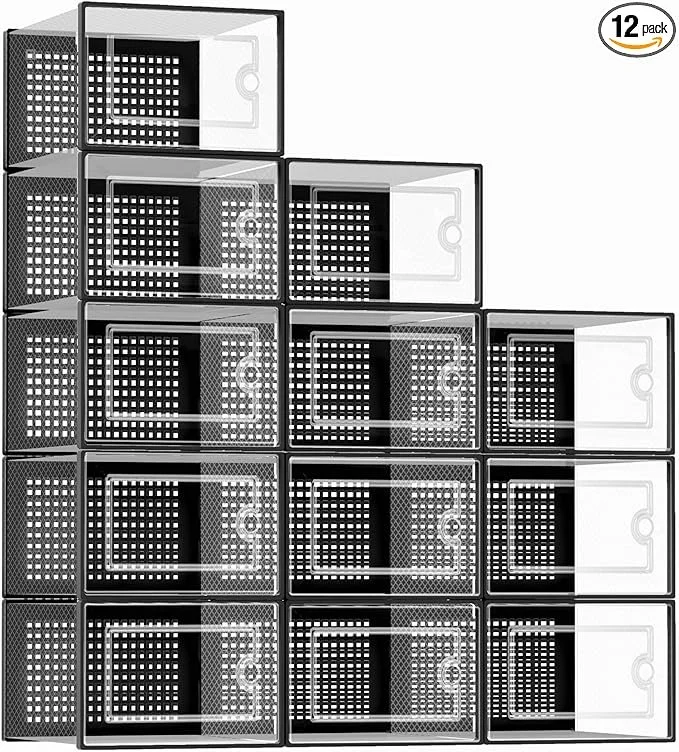 Stacked black and white plastic storage bins with perforated sides and sliding doors, arranged in a pyramid formation, labeled as a 12-pack.