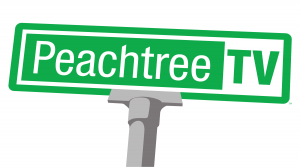 Street sign reading 'Peachtree TV' with a green background and white text.