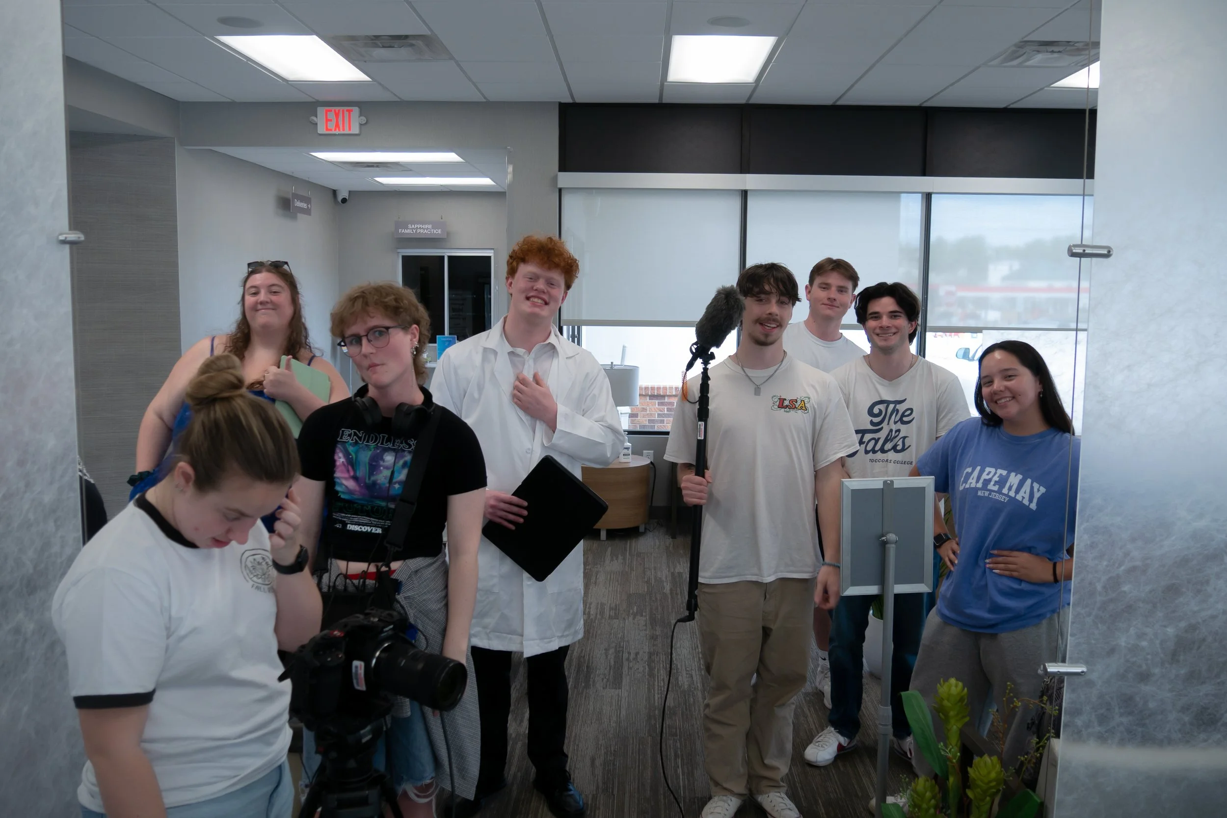 The entire crew in a candid photo behind the scenes during the filming of Waiting Room, a film by Good Fortune Pictures