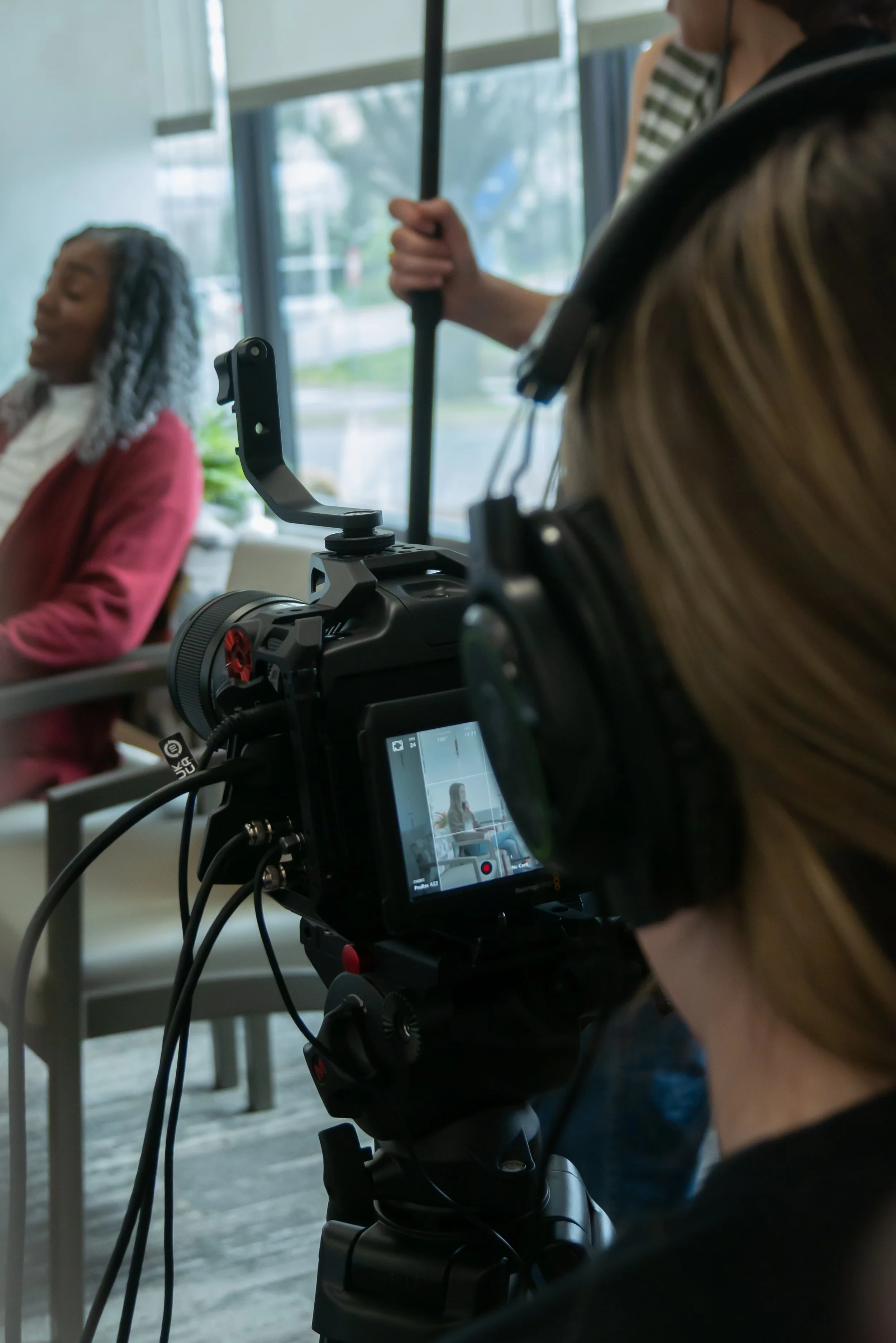 Ryan Garner filming a scene while Jamie Eckhoff directs on set for a Good Fortune Pictures production in New York