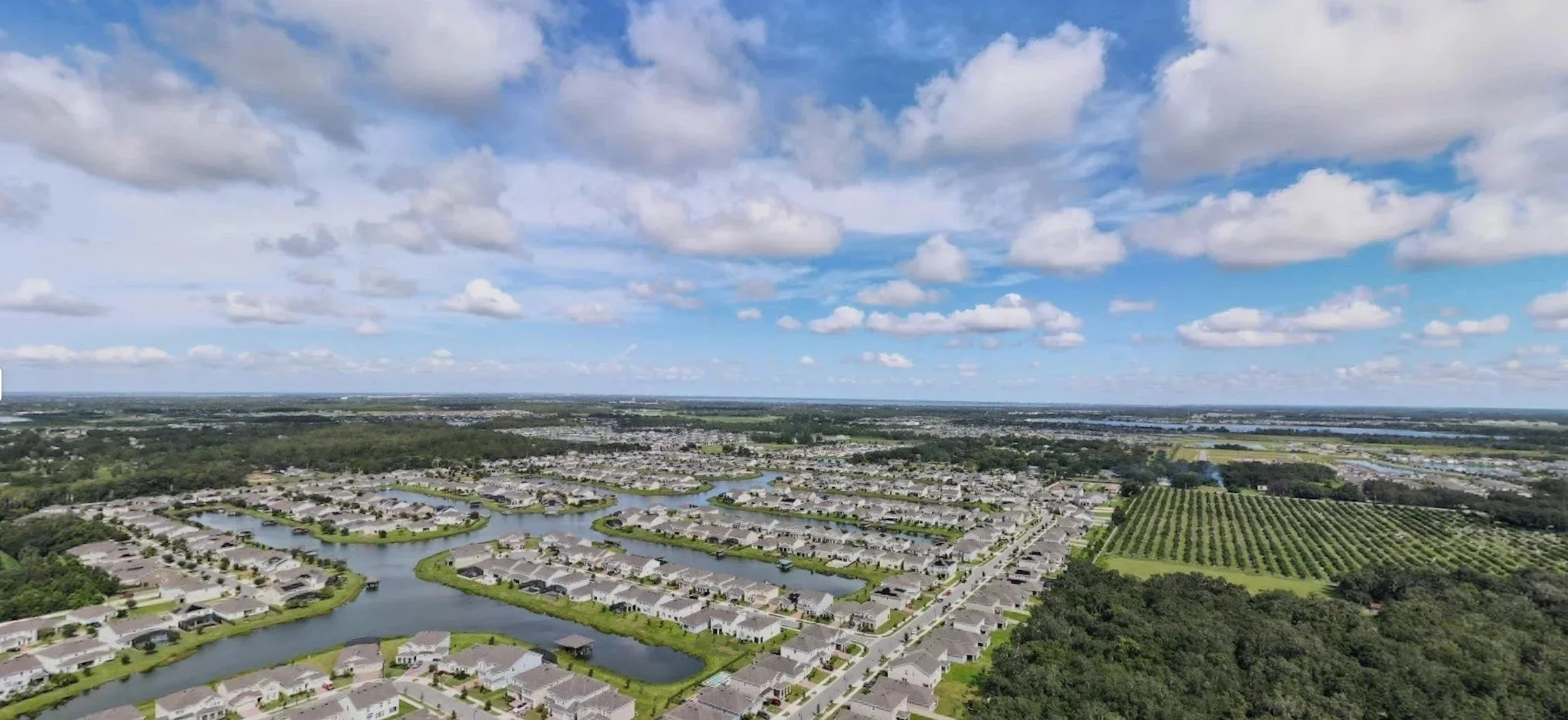 Hanover Lakes St. Cloud FL community entrance, waterfront homes, and new construction neighborhood.