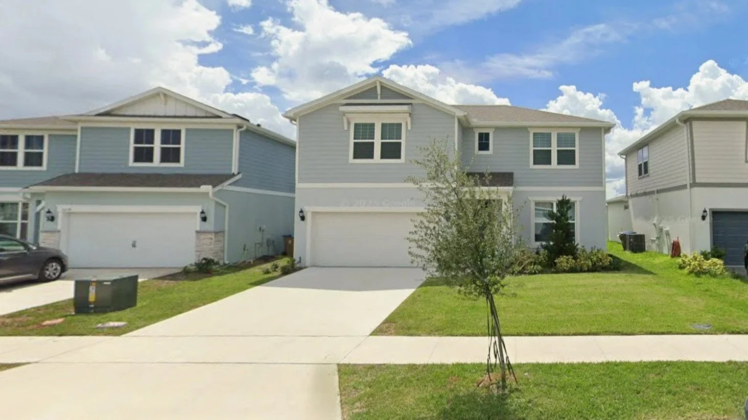 Live Oak Lake community in St. Cloud Florida — new construction homes, landscaped entrance, and family-friendly neighborhood.