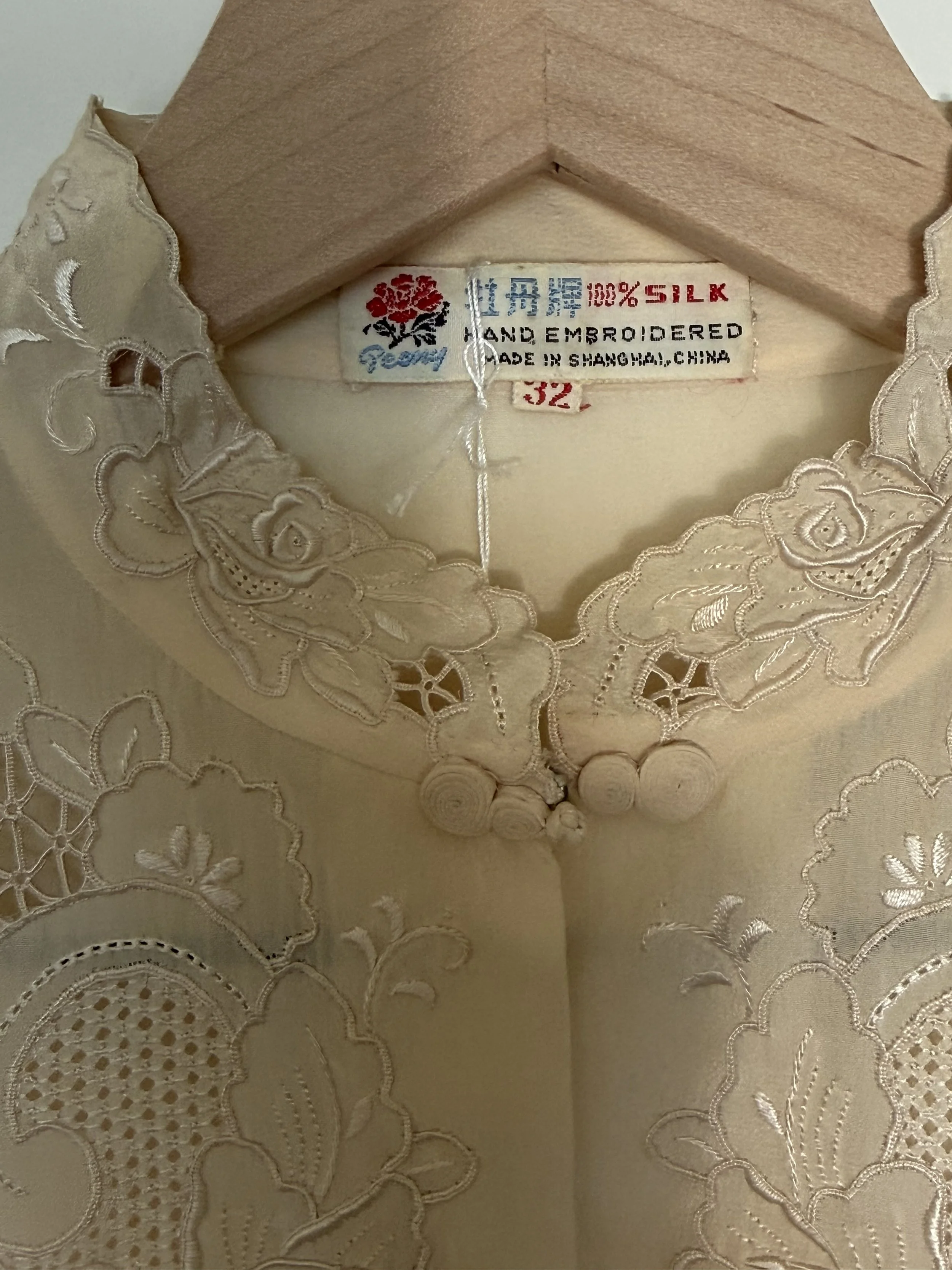silk embroidered blouse tag.jpeg