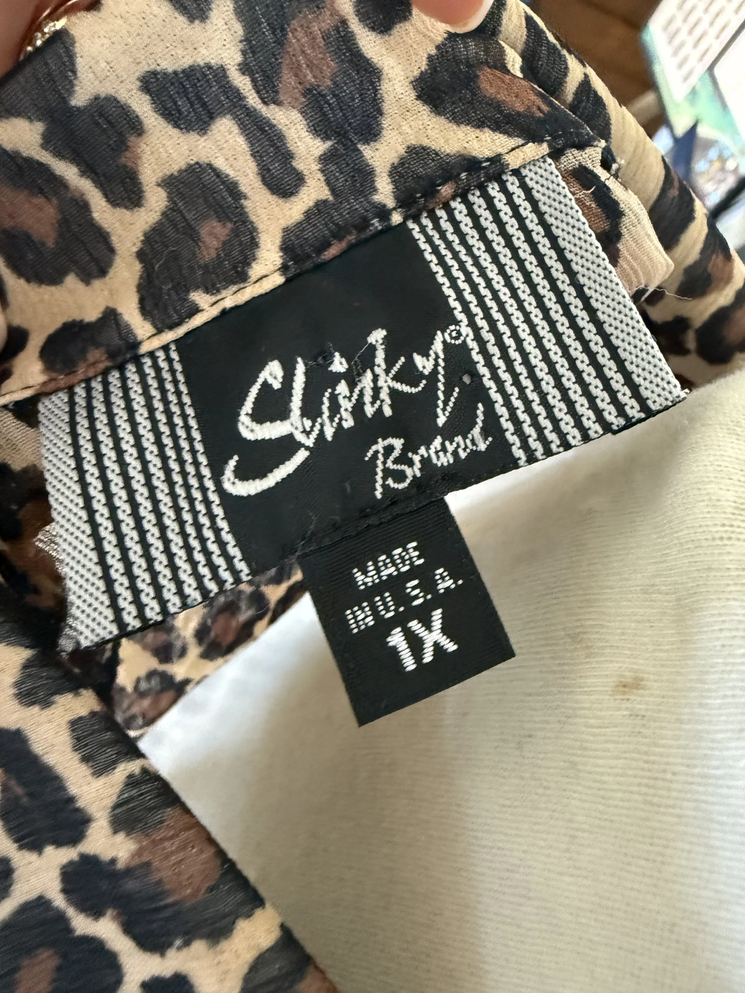 leopard blouse tag.jpeg