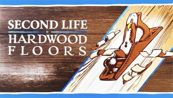 Sign advertising second life hardwood floors with a cartoon of a hand scraper working on a wooden floor.