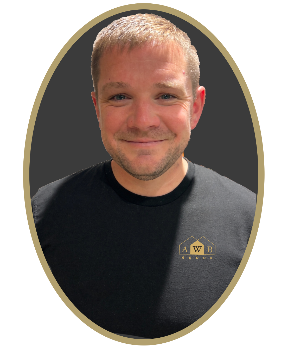 A smiling man with short blond hair and blue eyes, wearing a black t-shirt with a small logo that reads 'AWB Group'.