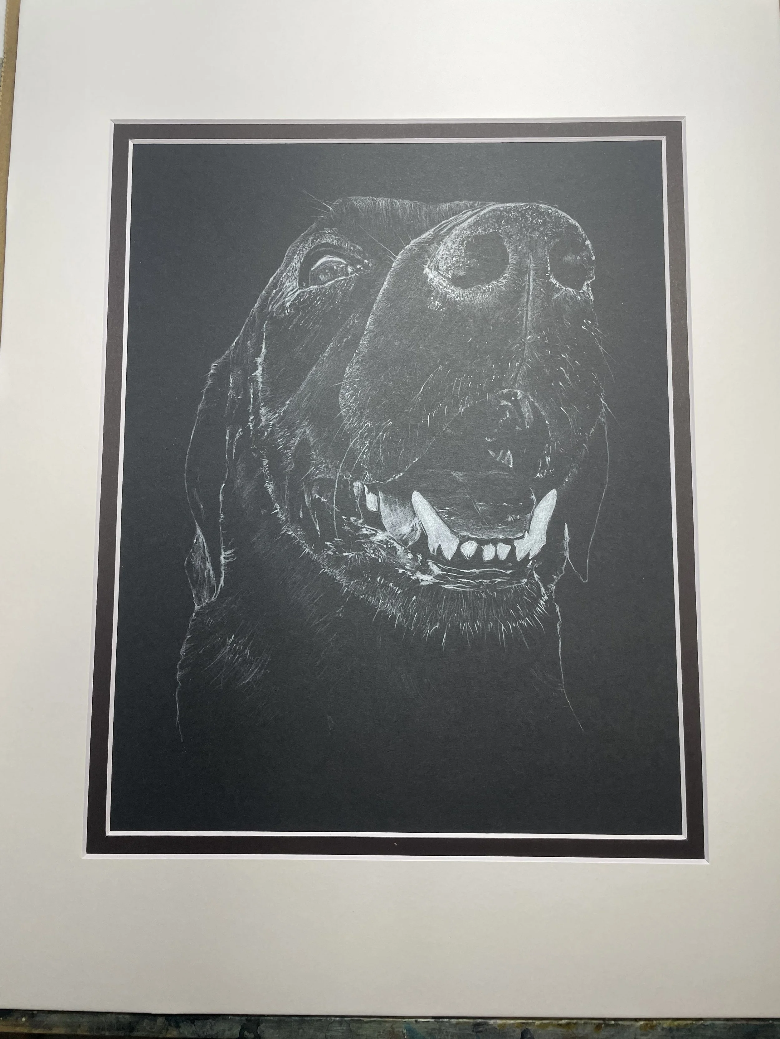 Black and white sketch of a smiling dog's face, with a focus on its nose and teeth.