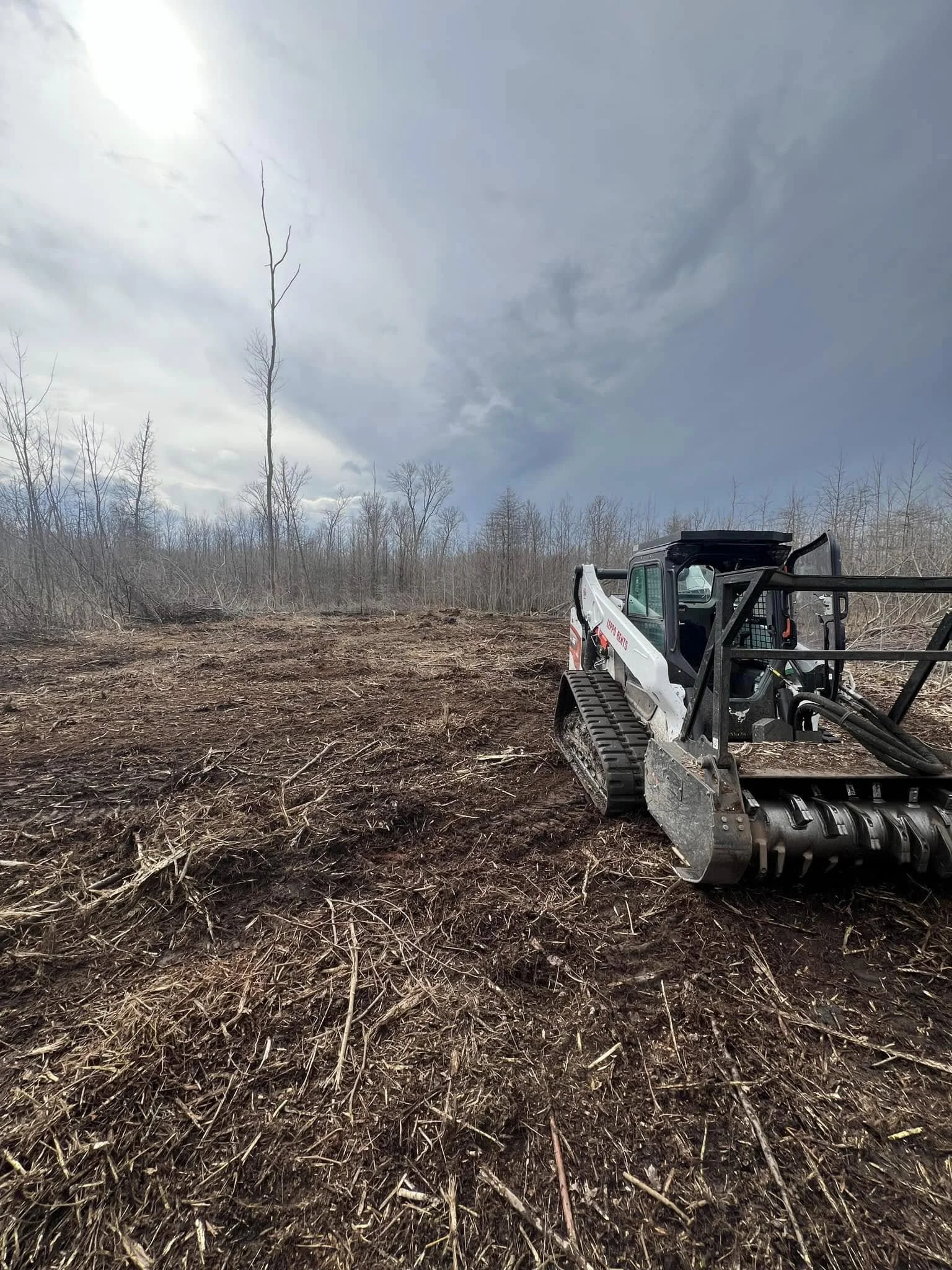 Forestry Mulcher in a cleared field in Lagrange Ohio