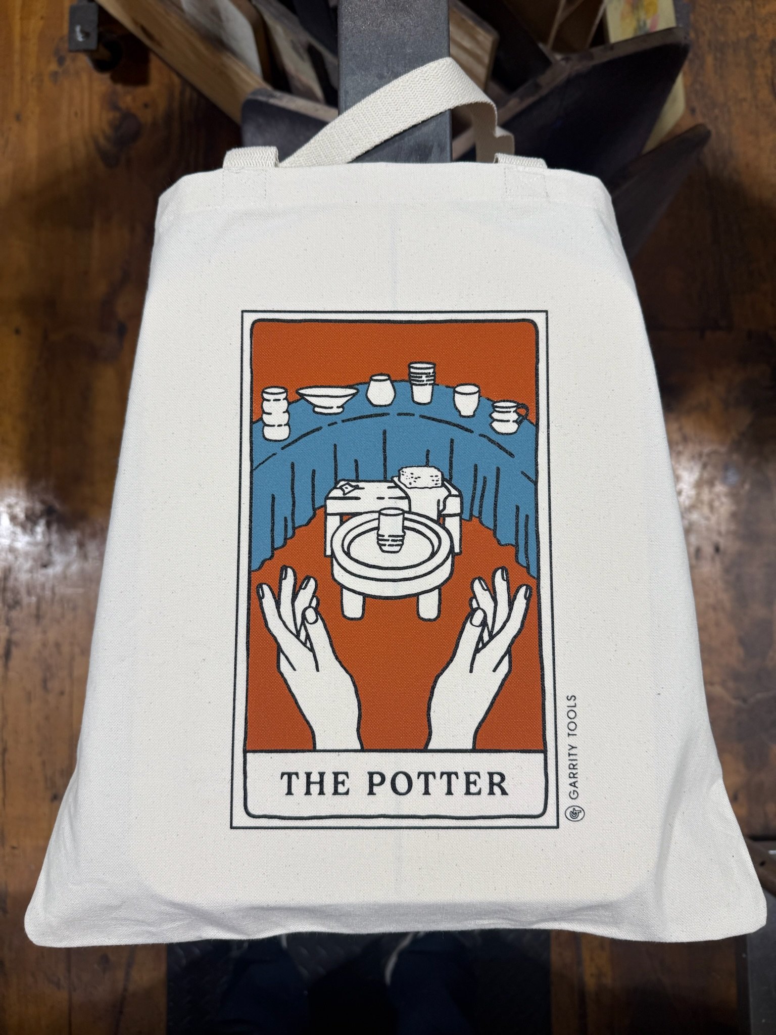 Screen Printed Tote Bag with a tarot style image called “The Potter"