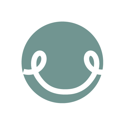 A smiley face with a green background and a happy expression.