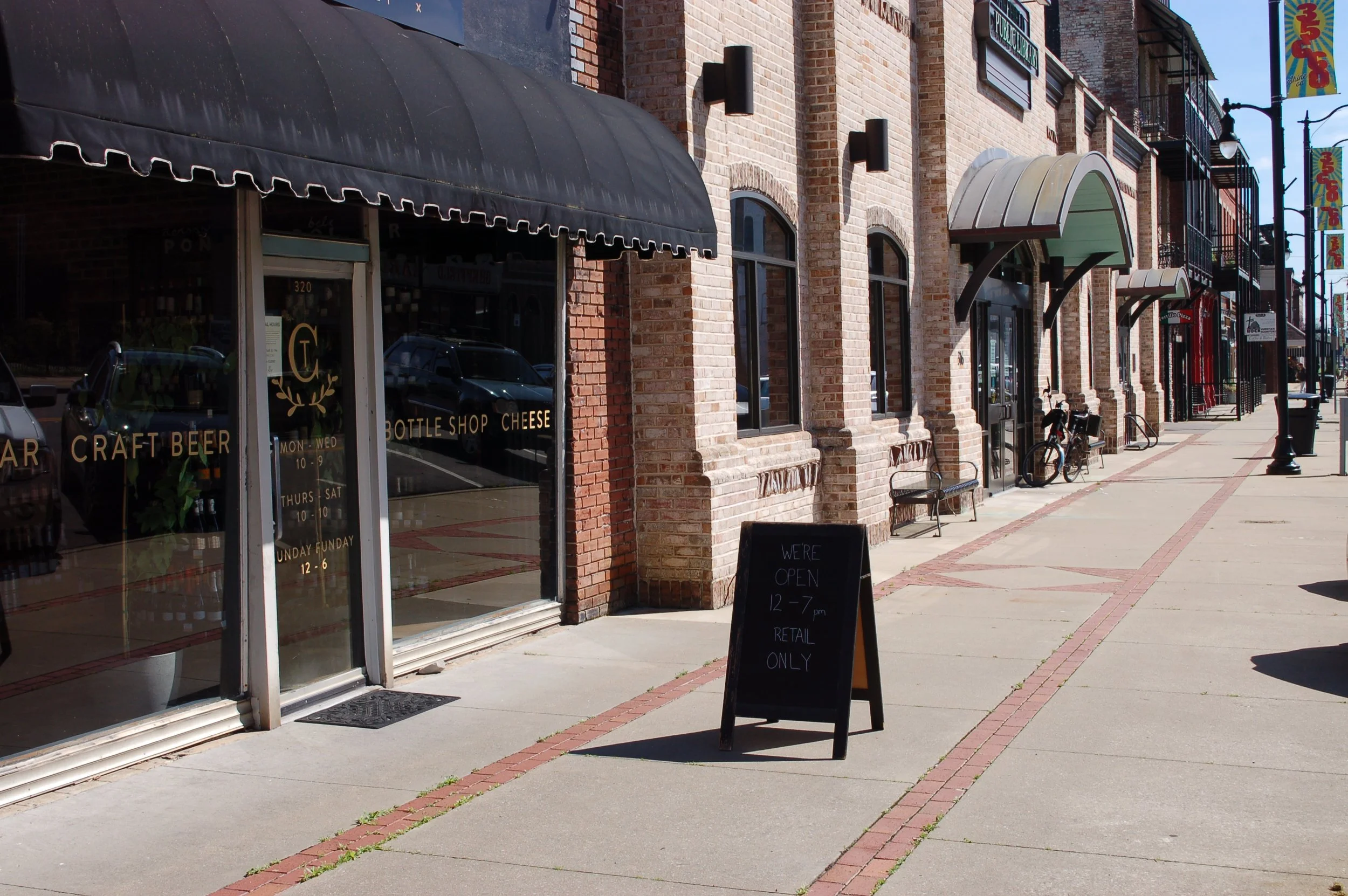 Downtown Sheffield Alabama businesses sidewalk.
