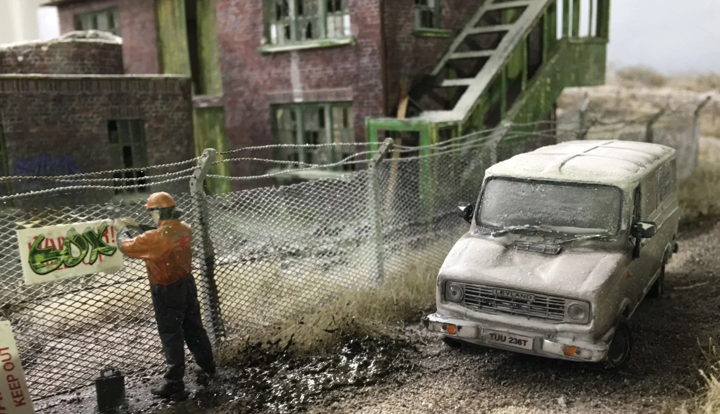 Simon George Simon George can be seen here modelling in action, on his Heaton Lodge Junction, known as Britain's Biggest Model Railway. It really is realism redefined. Simon George's yellow and blue British locomotive on a miniature railway track.