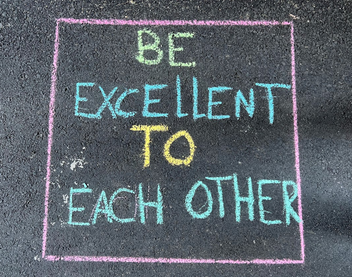 A chalkboard in the hallway reads Be excellent to each other