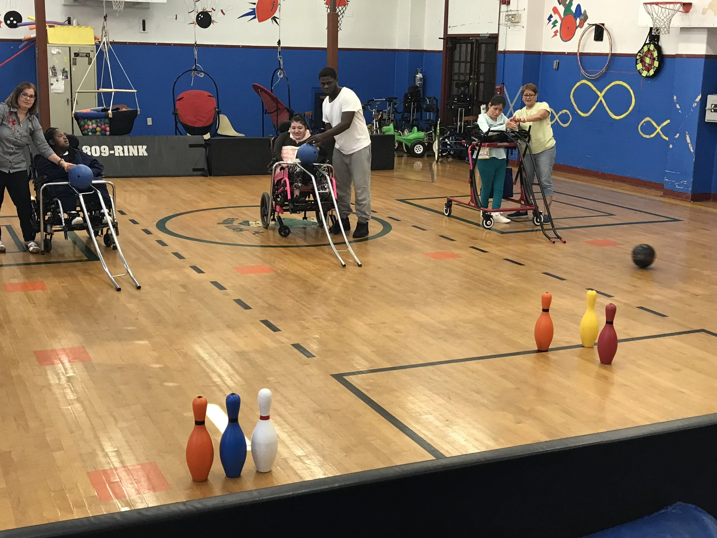 Bowling practice in the gym for Special Olympics